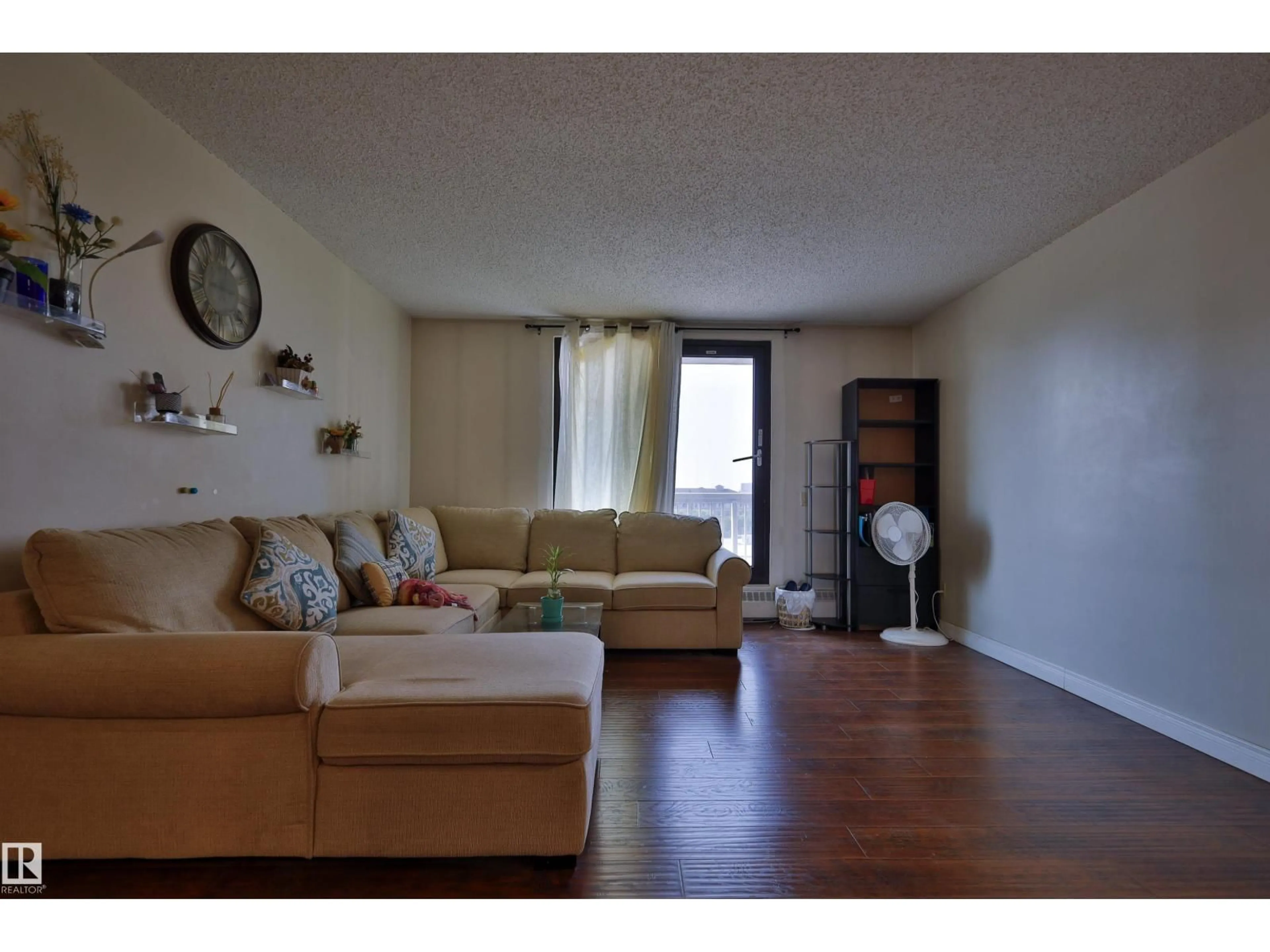 Living room with furniture, wood/laminate floor for 505 - 10175 109 ST NW, Edmonton Alberta T5J3P2