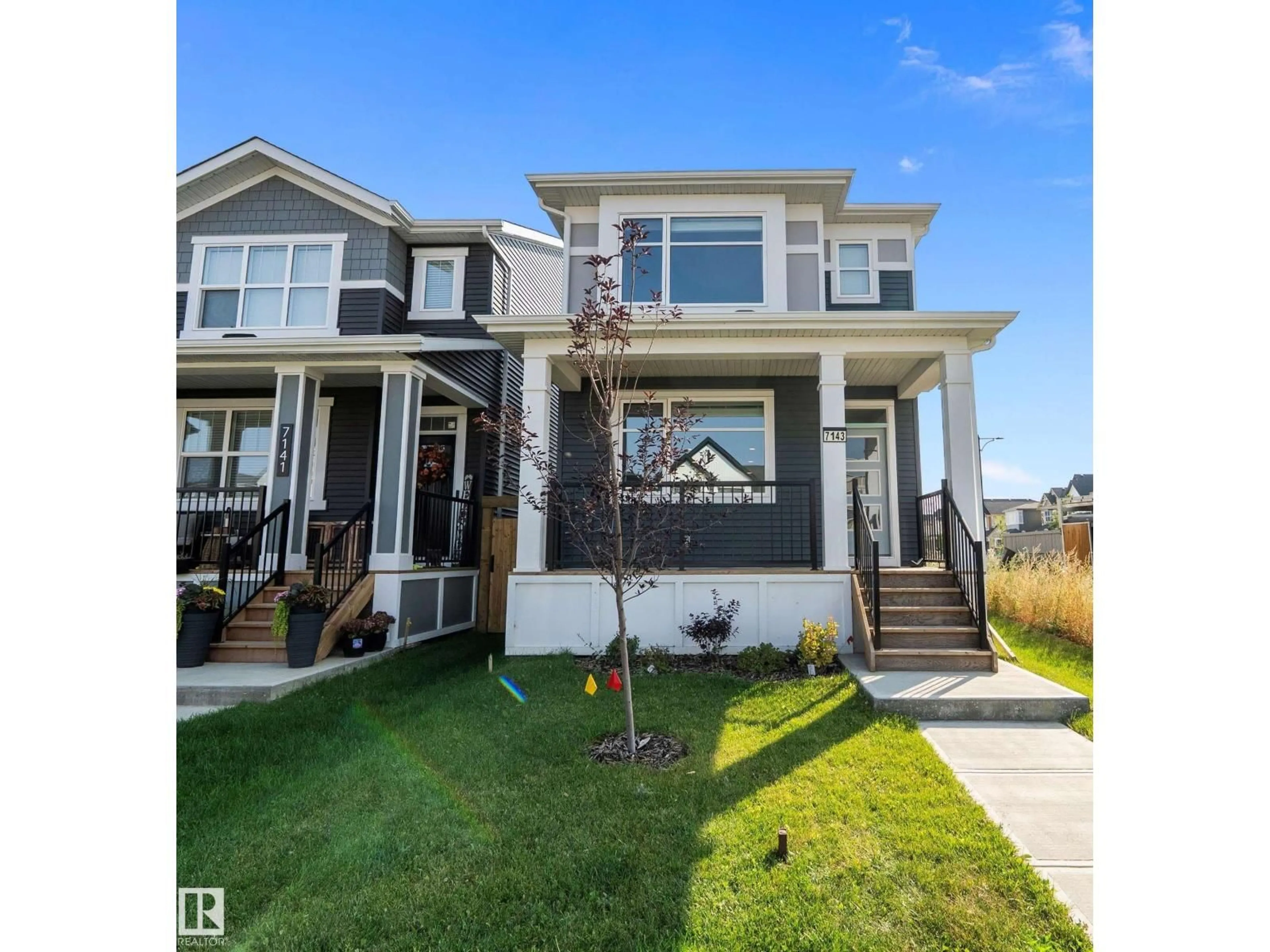 Home with vinyl exterior material, street for 7143 52 AV, Beaumont Alberta T4X2Z7