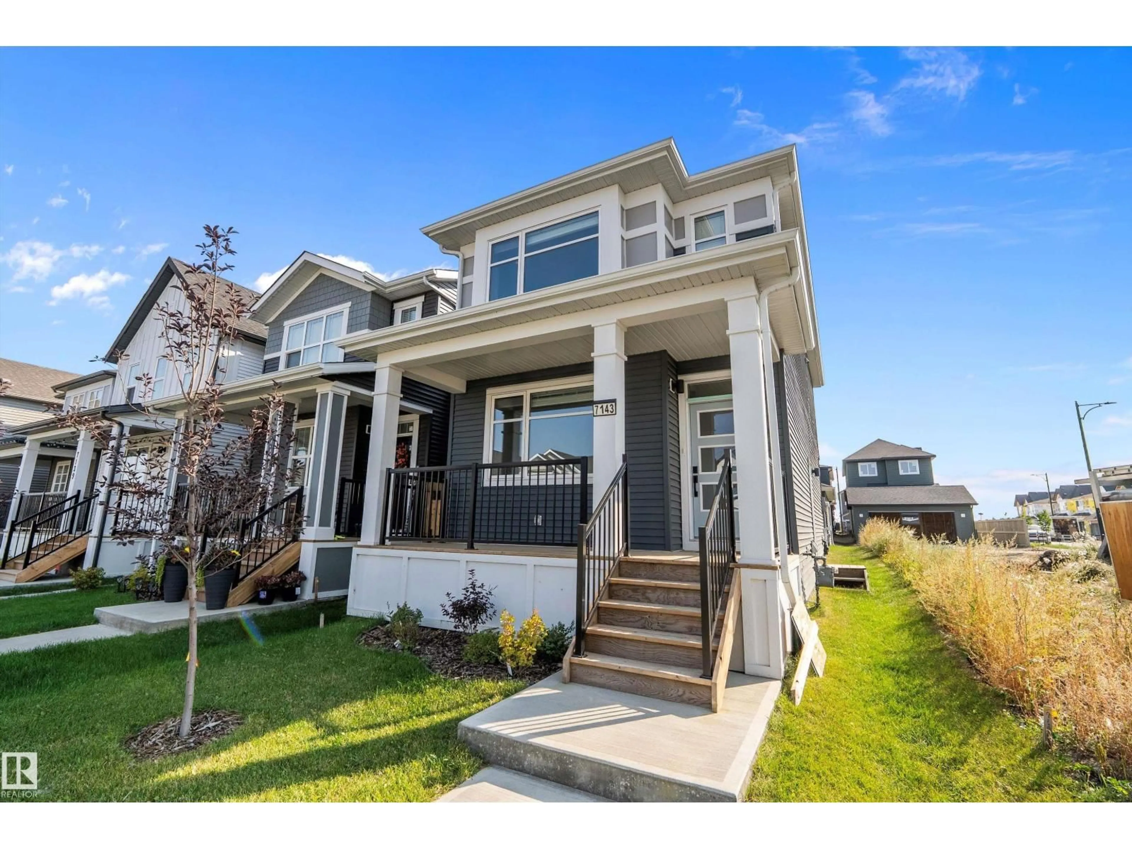 Home with vinyl exterior material, street for 7143 52 AV, Beaumont Alberta T4X2Z7
