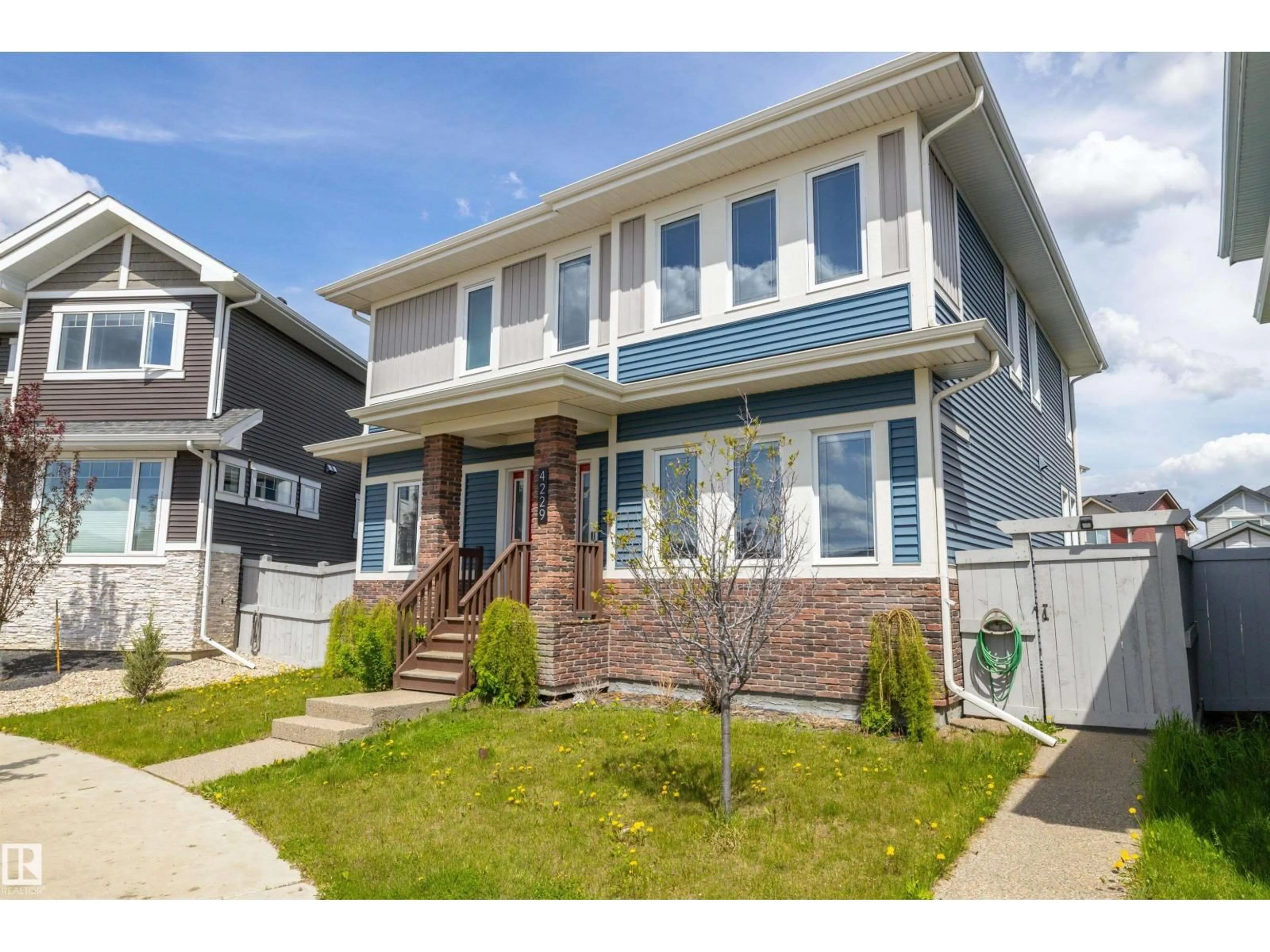 Home with vinyl exterior material, street for 4229 VETERANS WY, Edmonton Alberta T5E6W7
