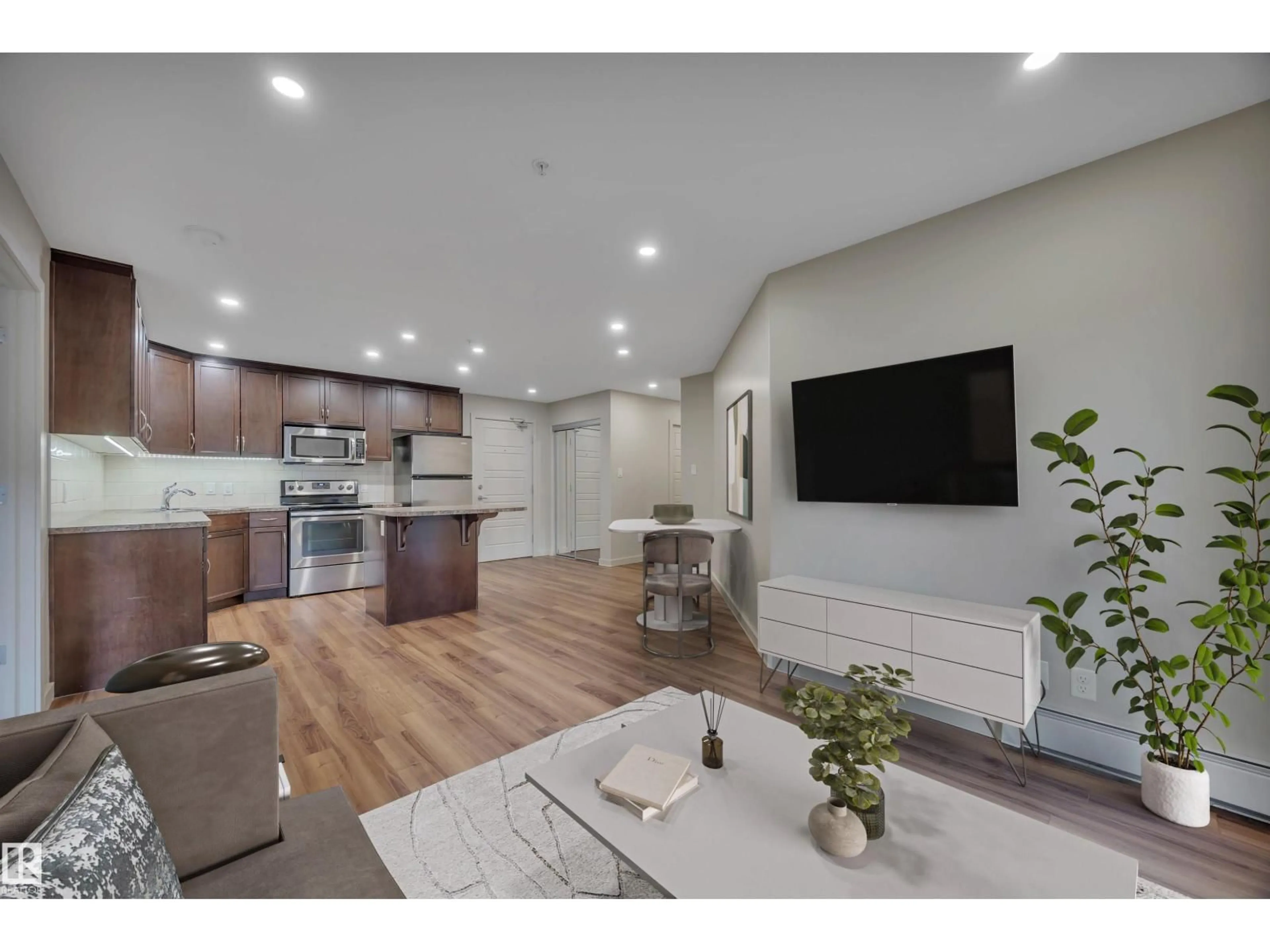 Open concept kitchen, wood/laminate floor for #261 - 11517 ELLERSLIE RD, Edmonton Alberta T6W2A9