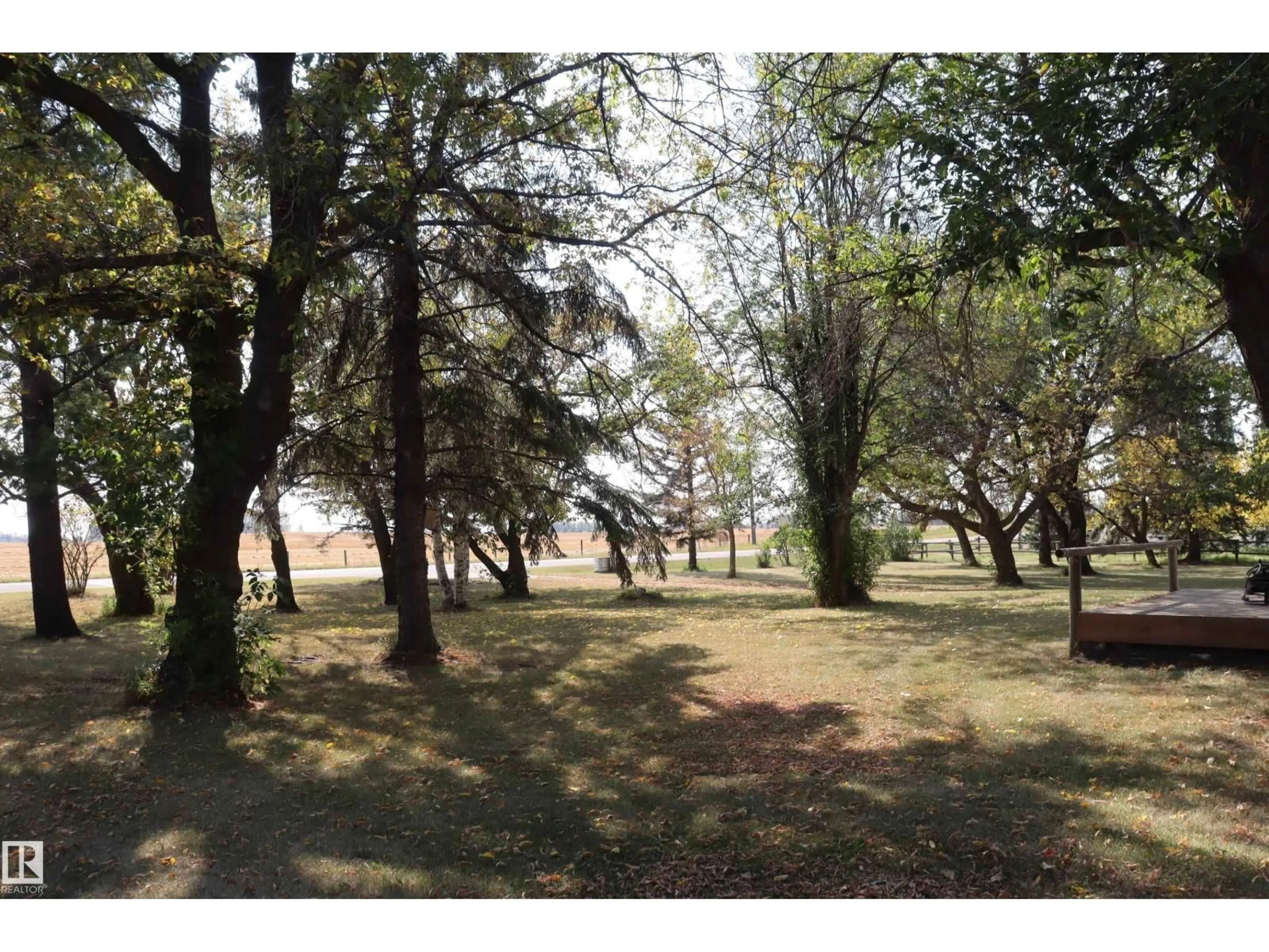 A pic from outside/outdoor area/front of a property/back of a property/a pic from drone, forest/trees view for 243066 TWP. RD., Rural Wetaskiwin County Alberta T9A2G3