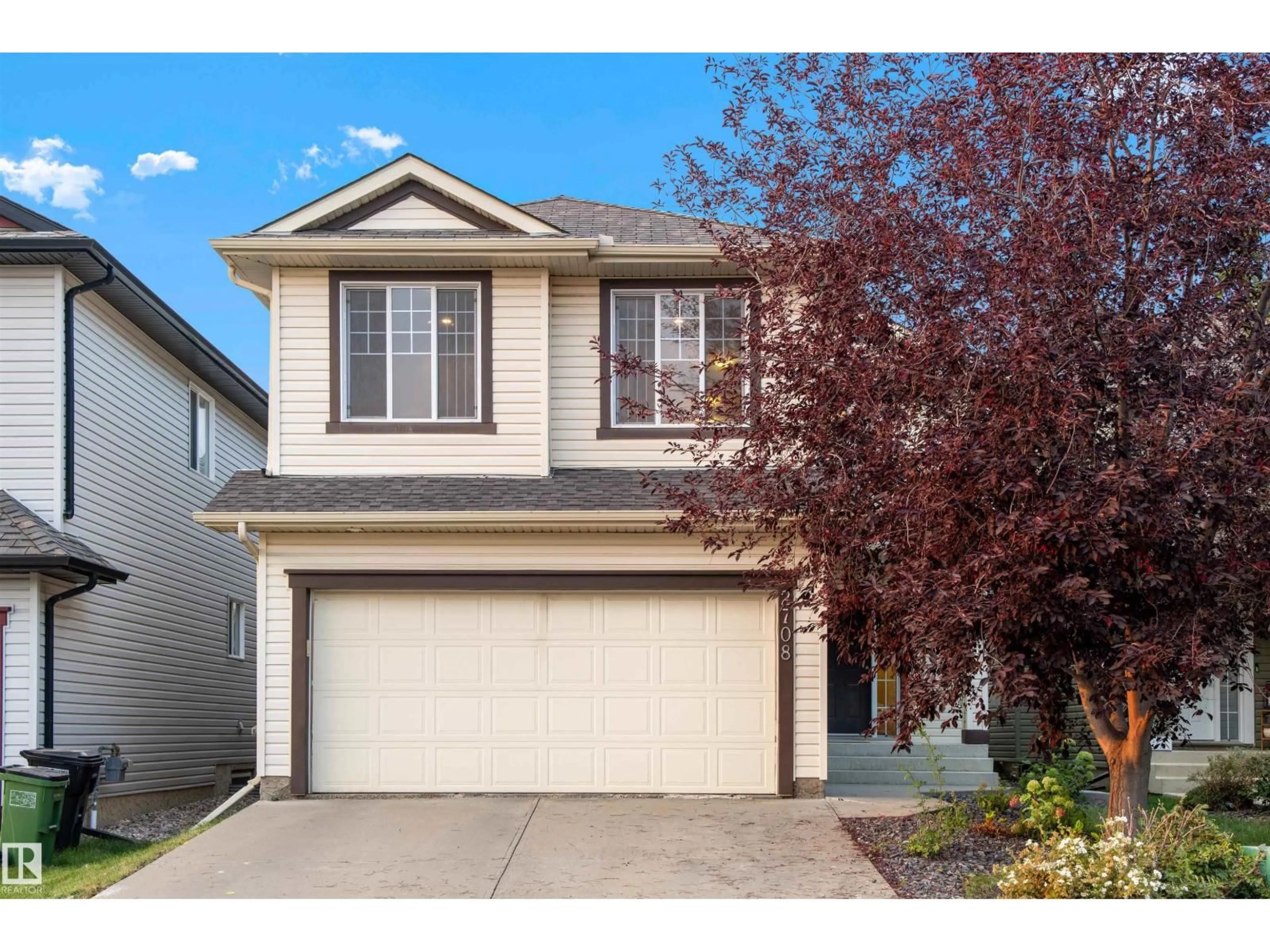 Home with vinyl exterior material, street for 2708 MILES PL, Edmonton Alberta T6W0B3