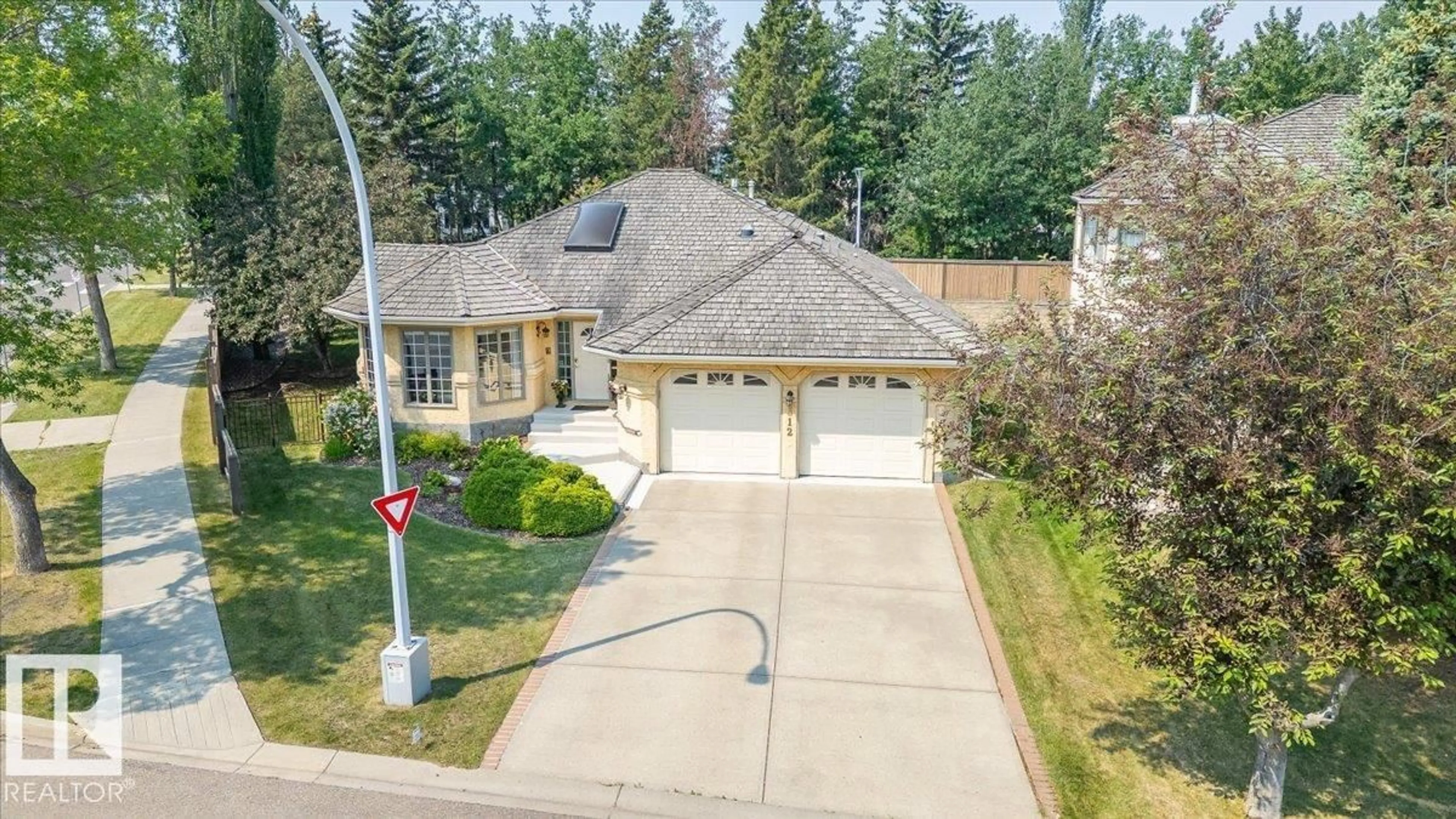 A pic from outside/outdoor area/front of a property/back of a property/a pic from drone, street for 312 BURTON RD, Edmonton Alberta T6R2G7