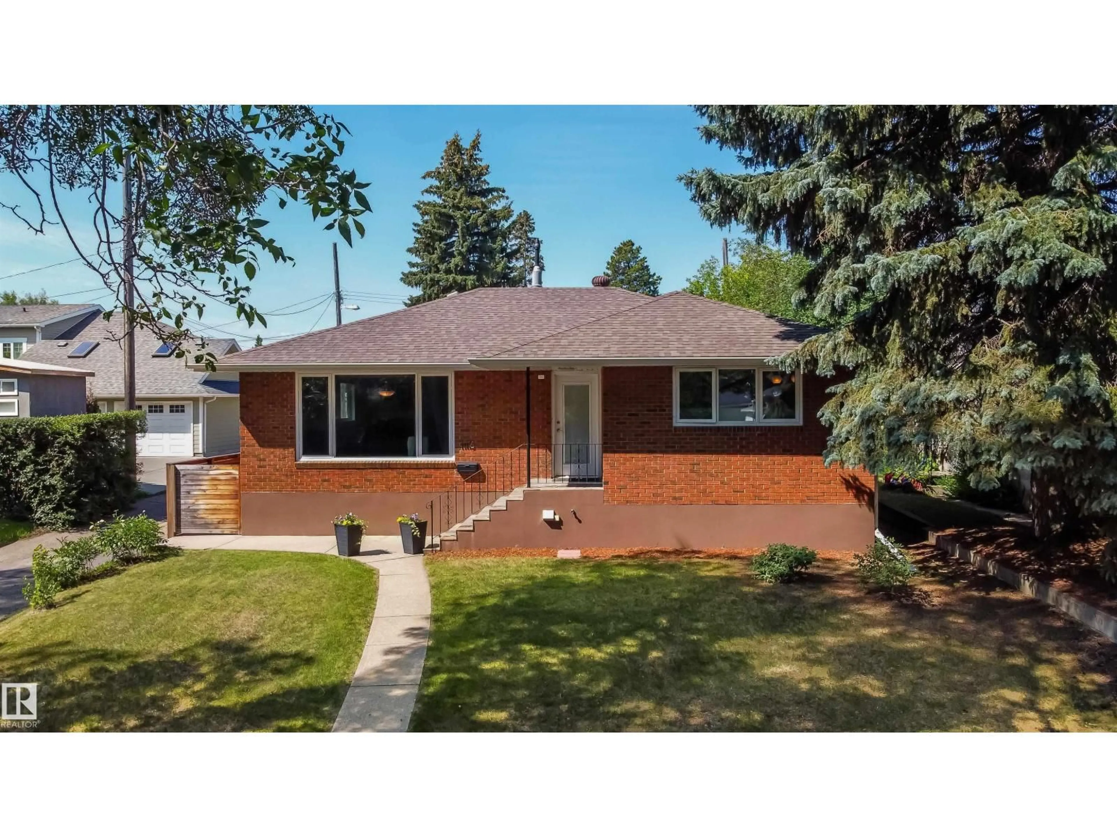 Home with brick exterior material, street for 11116 69 ST, Edmonton Alberta T5B1R4