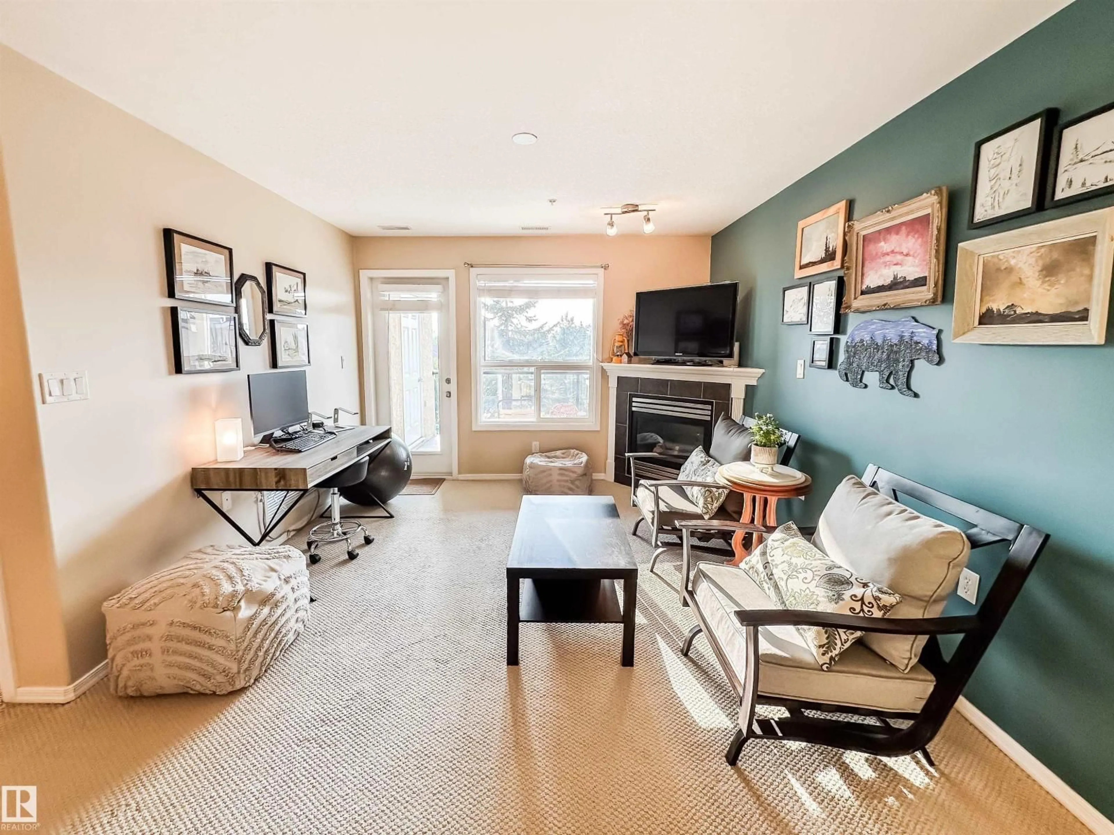 Living room with furniture, wood/laminate floor for #320 - 1320 RUTHERFORD RD, Edmonton Alberta T6W0B6