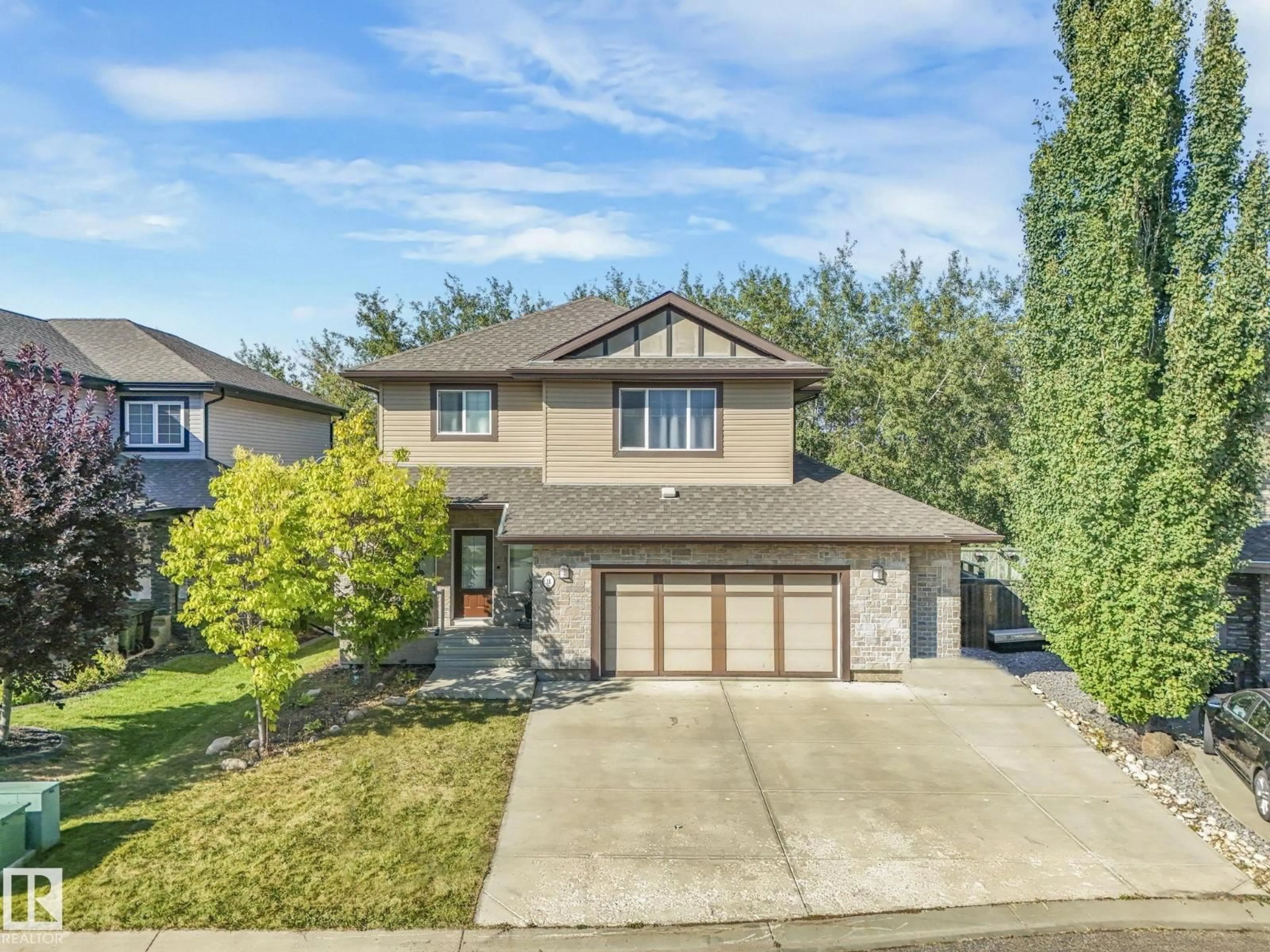 Home with vinyl exterior material, street for 18 VALARIE BA, Spruce Grove Alberta T7X0J7