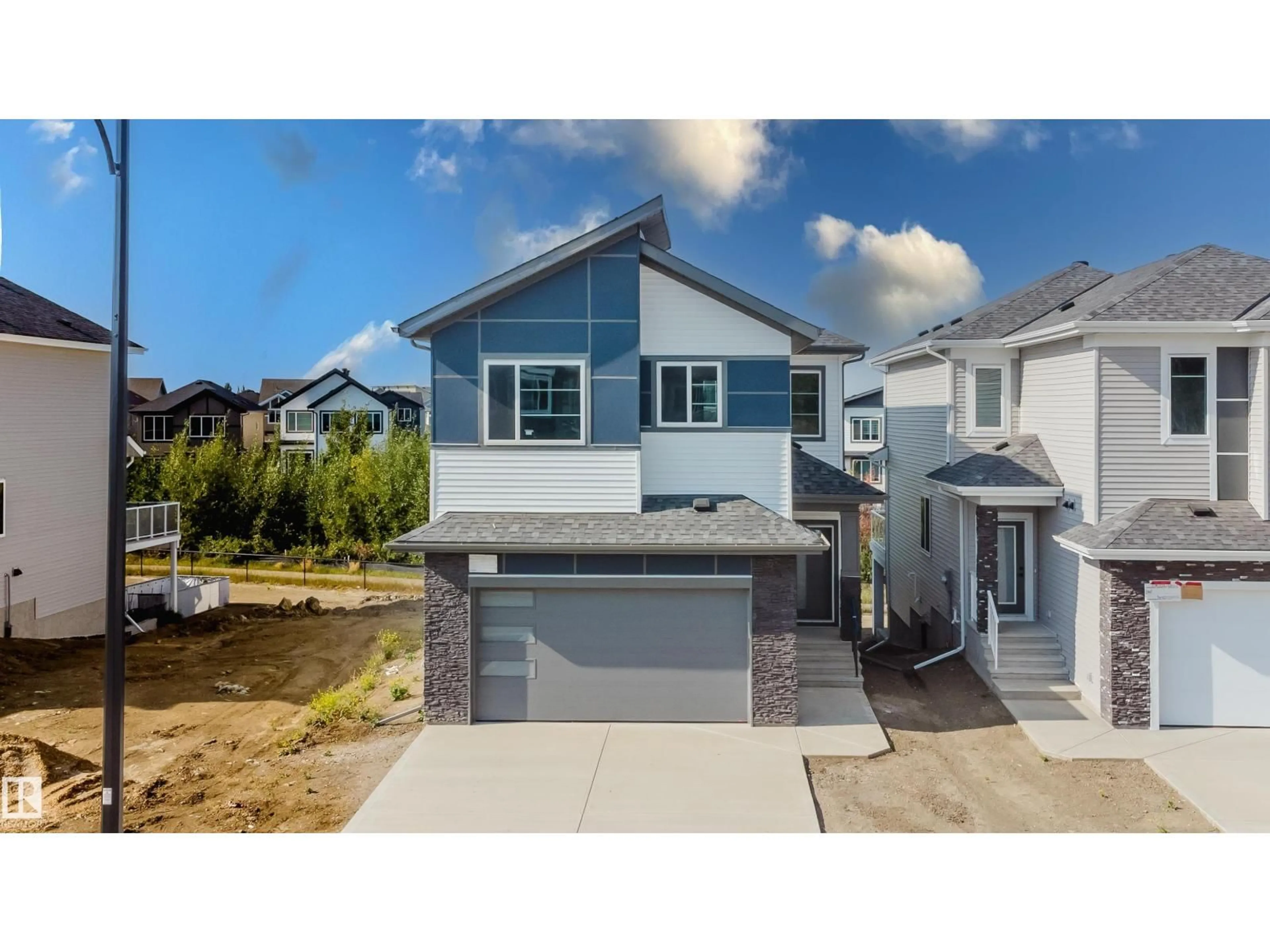 Home with vinyl exterior material, street for 69 MEADOWGROVE LN, Spruce Grove Alberta T7X0W2