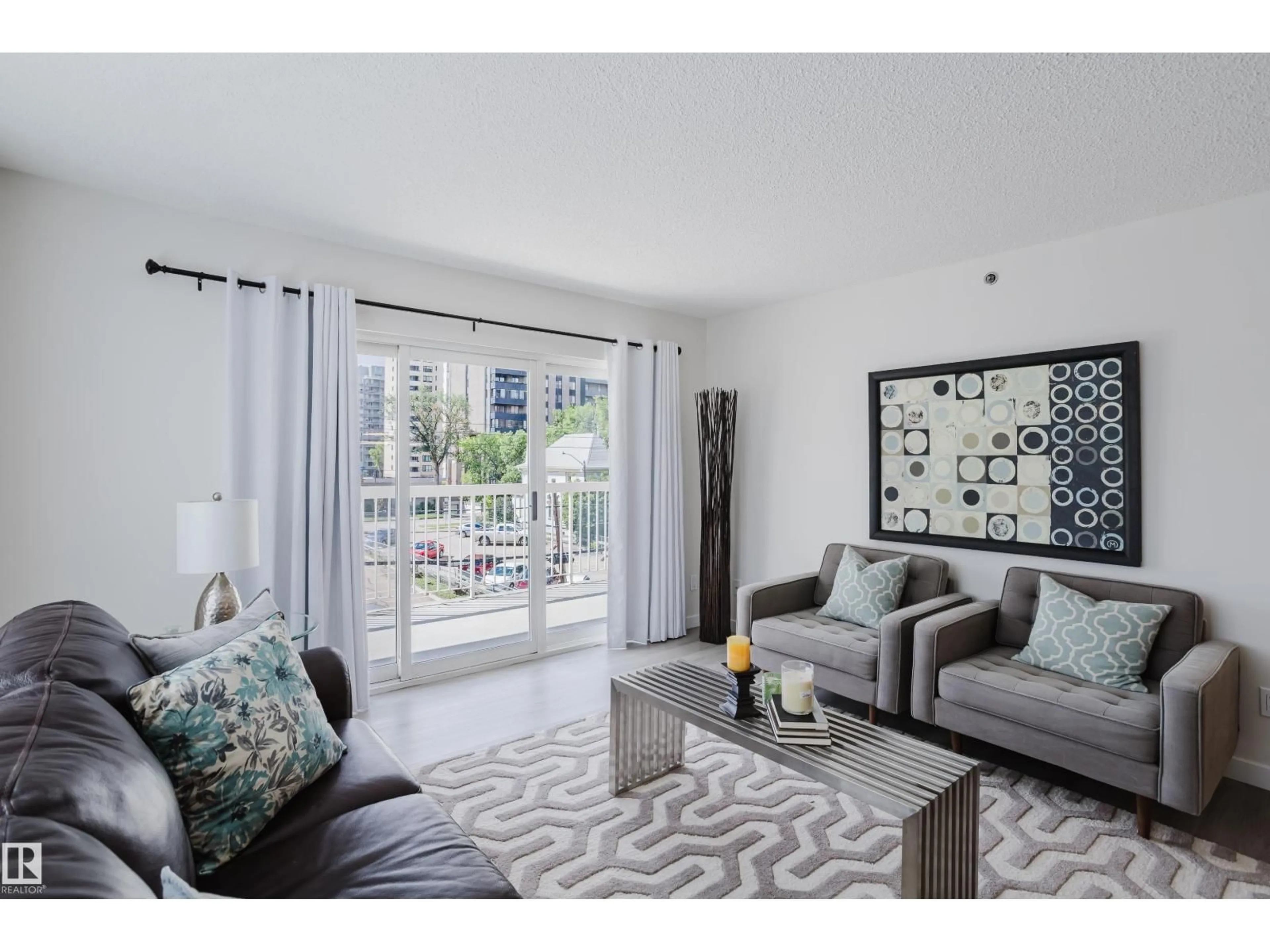Living room with furniture, unknown for 304 - 10130 114 ST NW, Edmonton Alberta T5K2S6