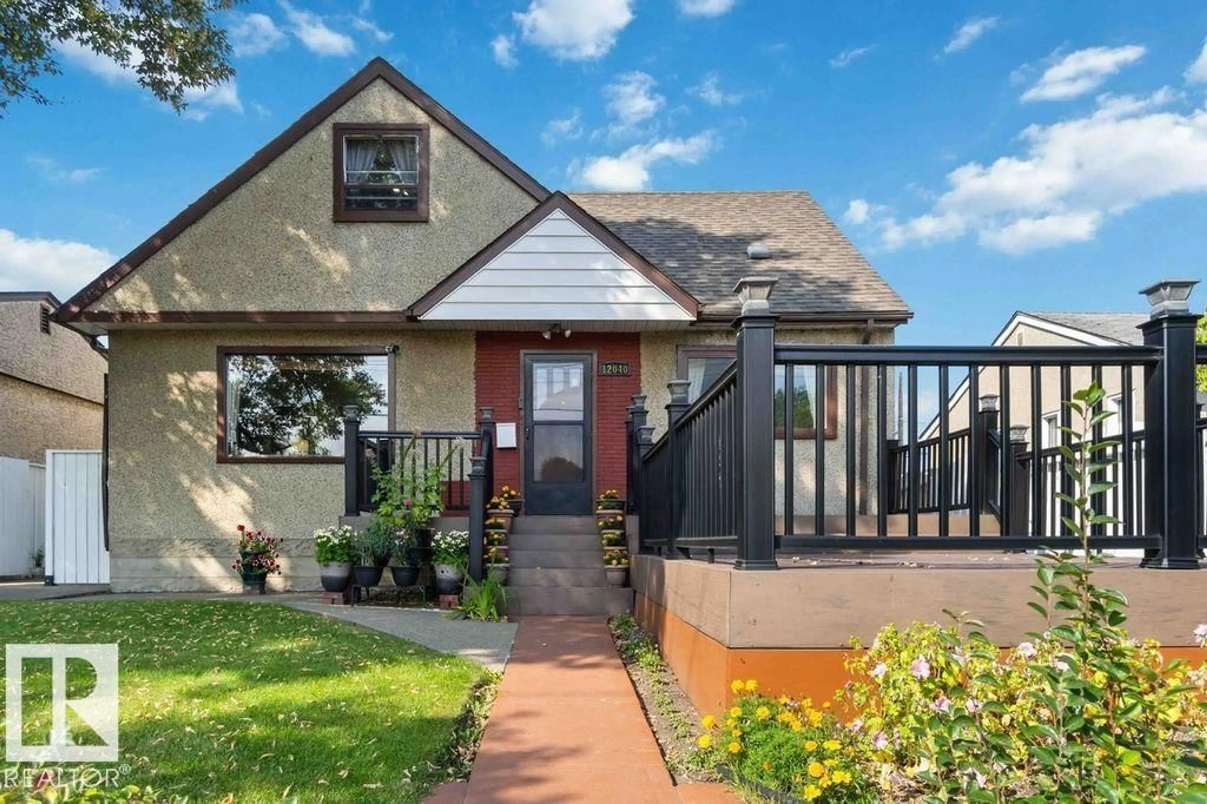 Home with brick exterior material, street for NW - 12040 50 ST, Edmonton Alberta T5W3C4