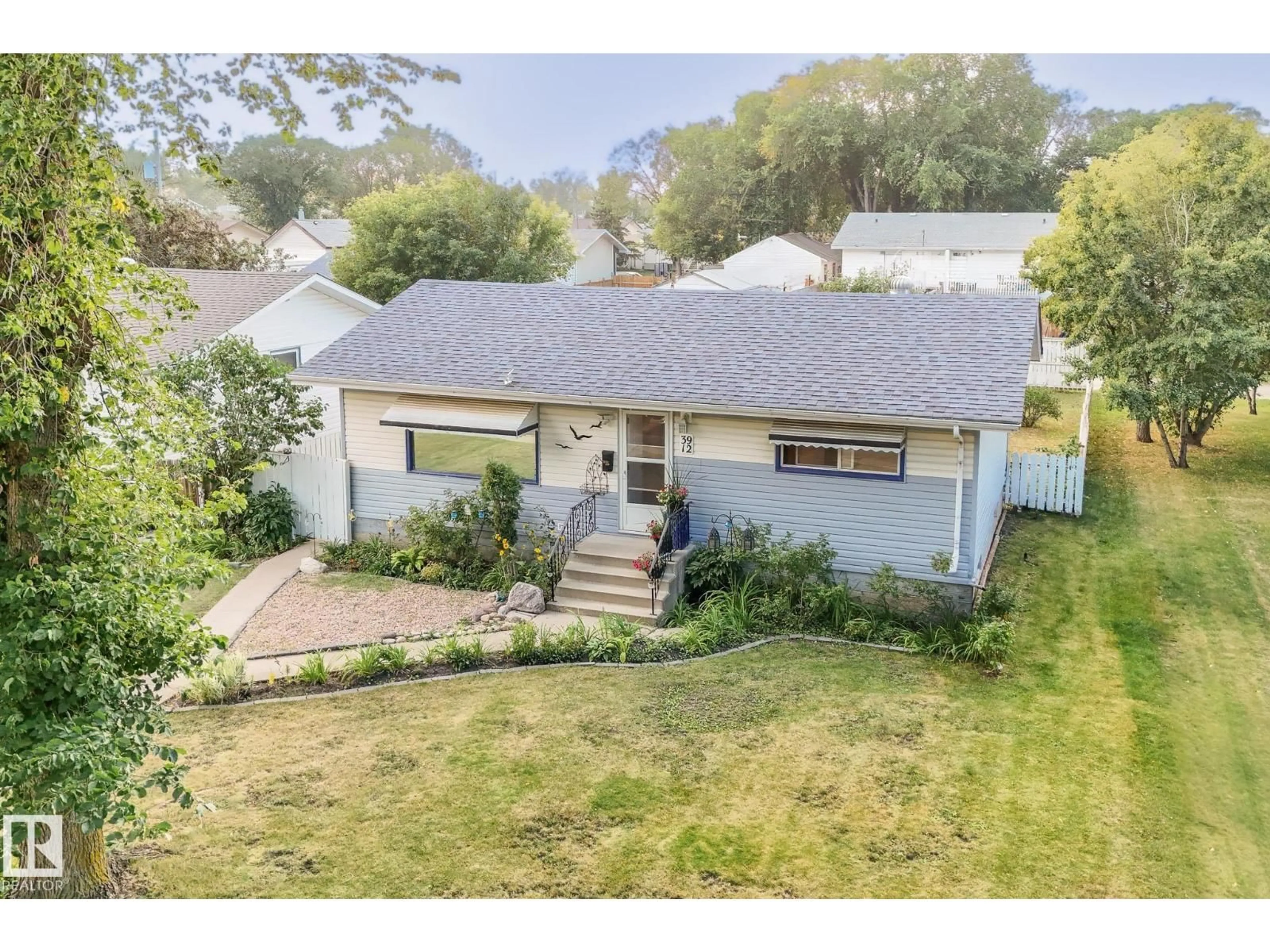 A pic from outside/outdoor area/front of a property/back of a property/a pic from drone, street for 3912 52 ST, Wetaskiwin Alberta T9A1M6
