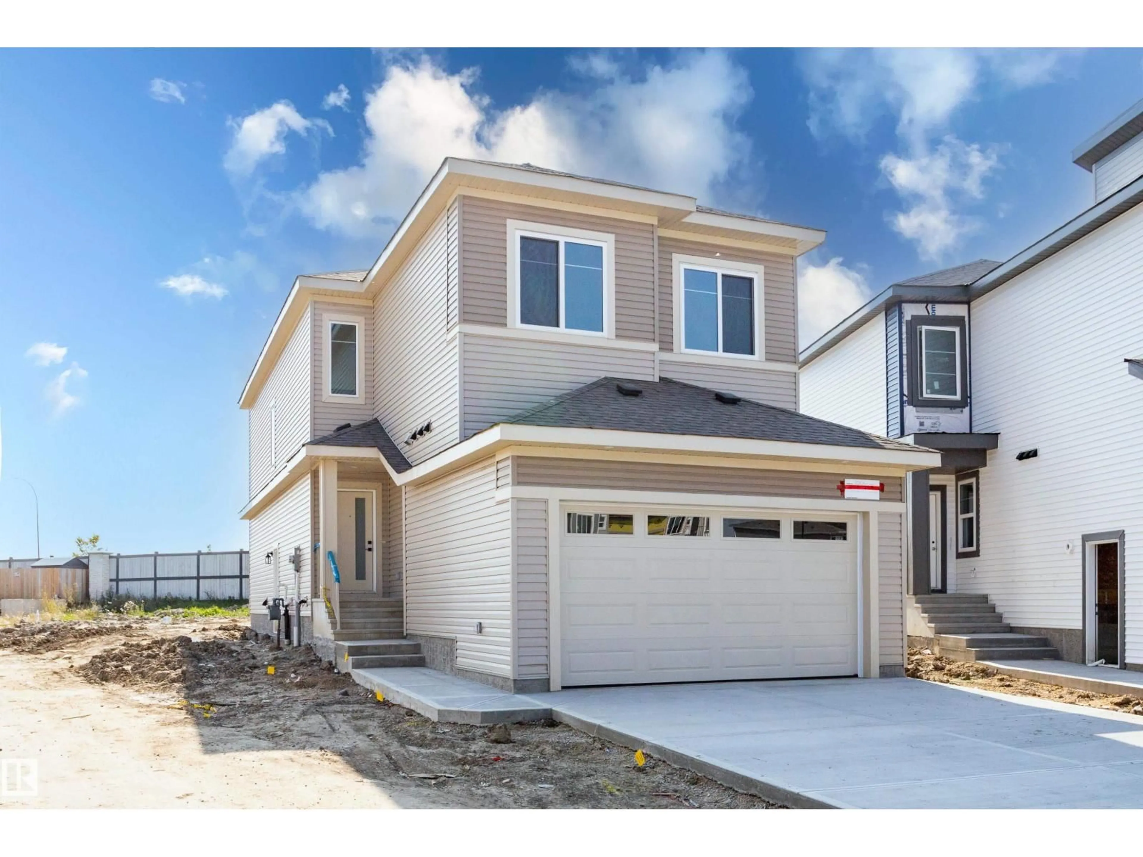 Home with vinyl exterior material, street for 298 MUNN WY, Leduc Alberta T9E1V1