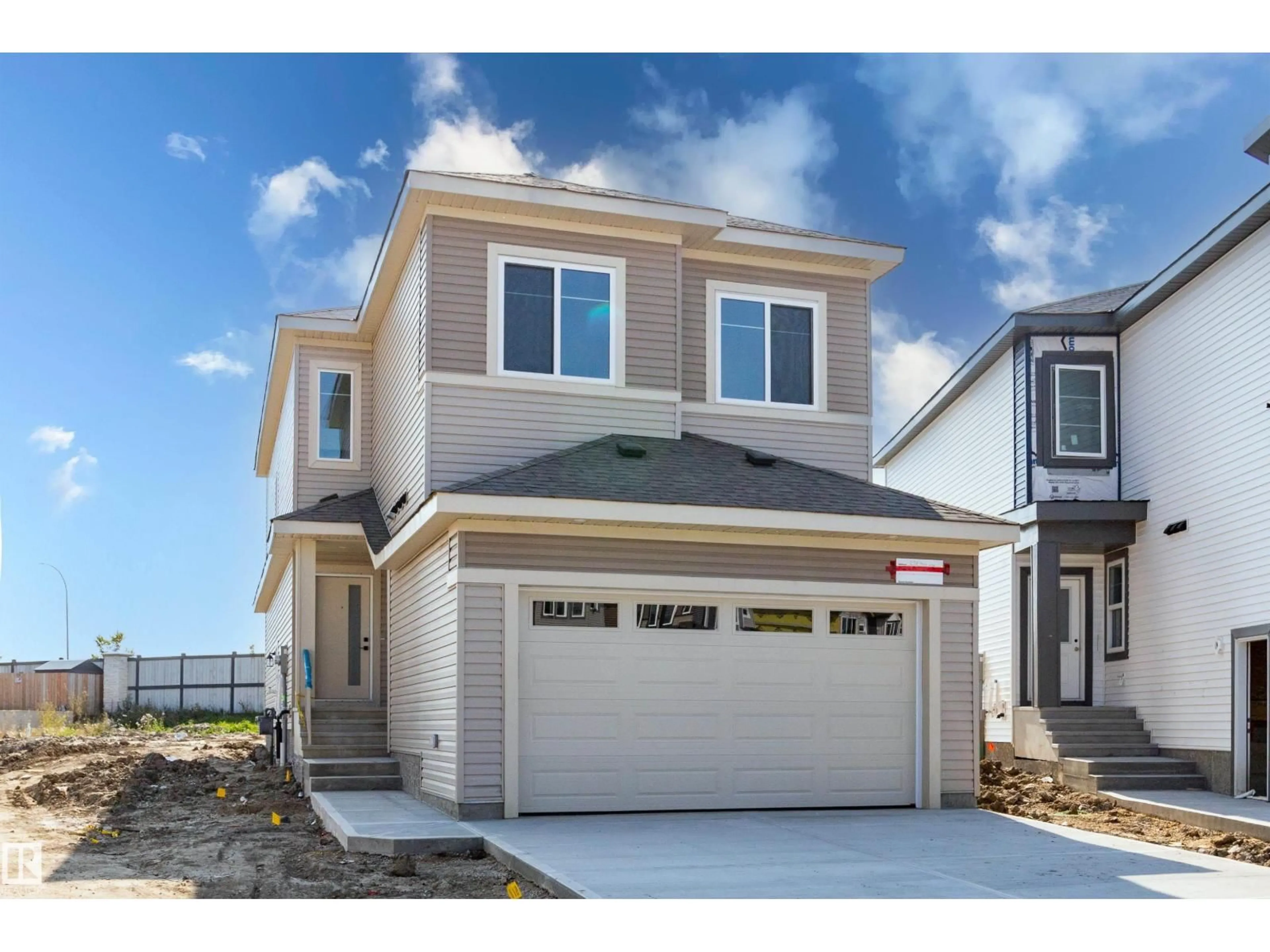 Home with vinyl exterior material, street for 298 MUNN WY, Leduc Alberta T9E1V1