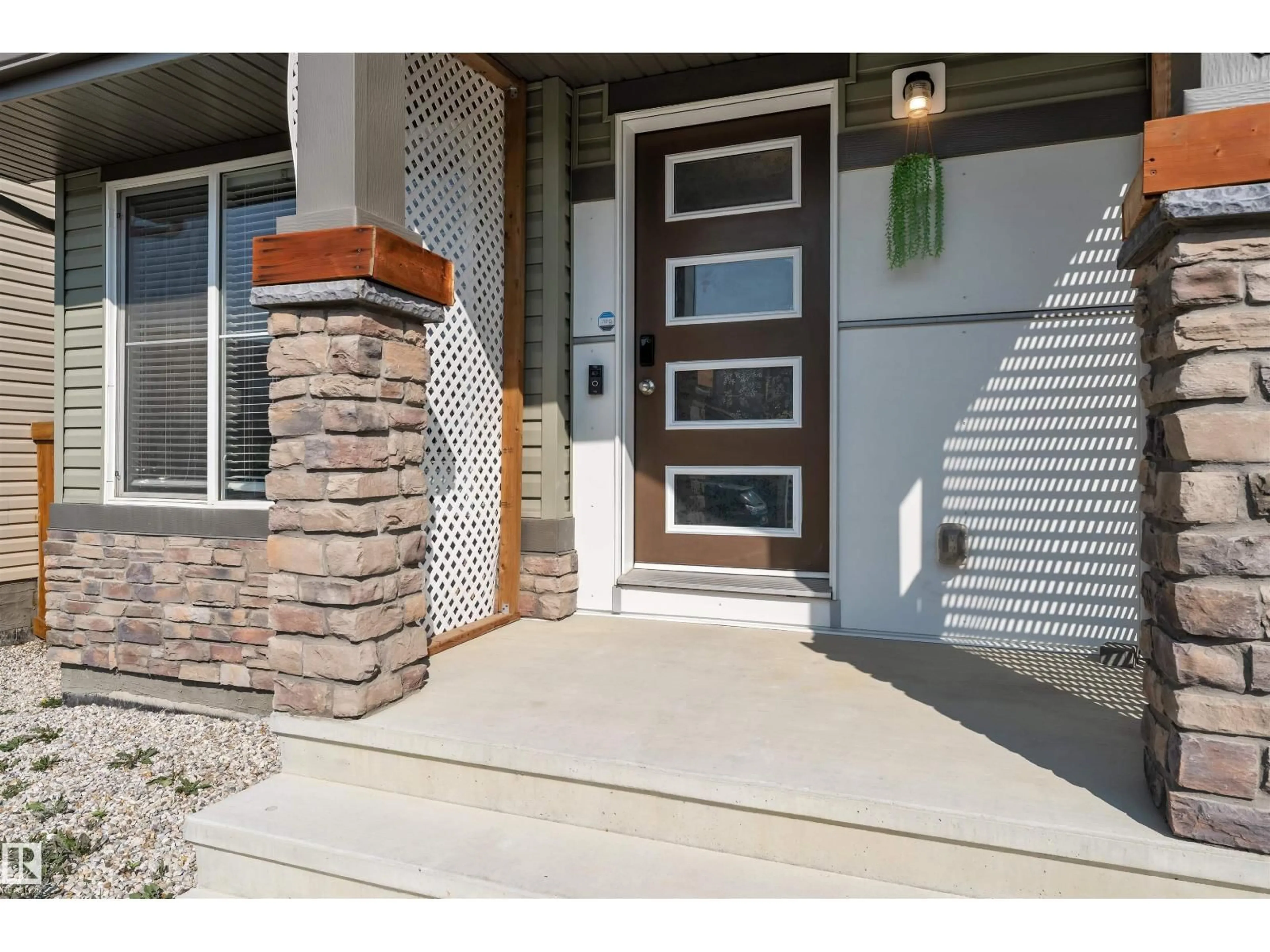 Home with brick exterior material, street for NW - 4620 175 AV, Edmonton Alberta T5Y4A1