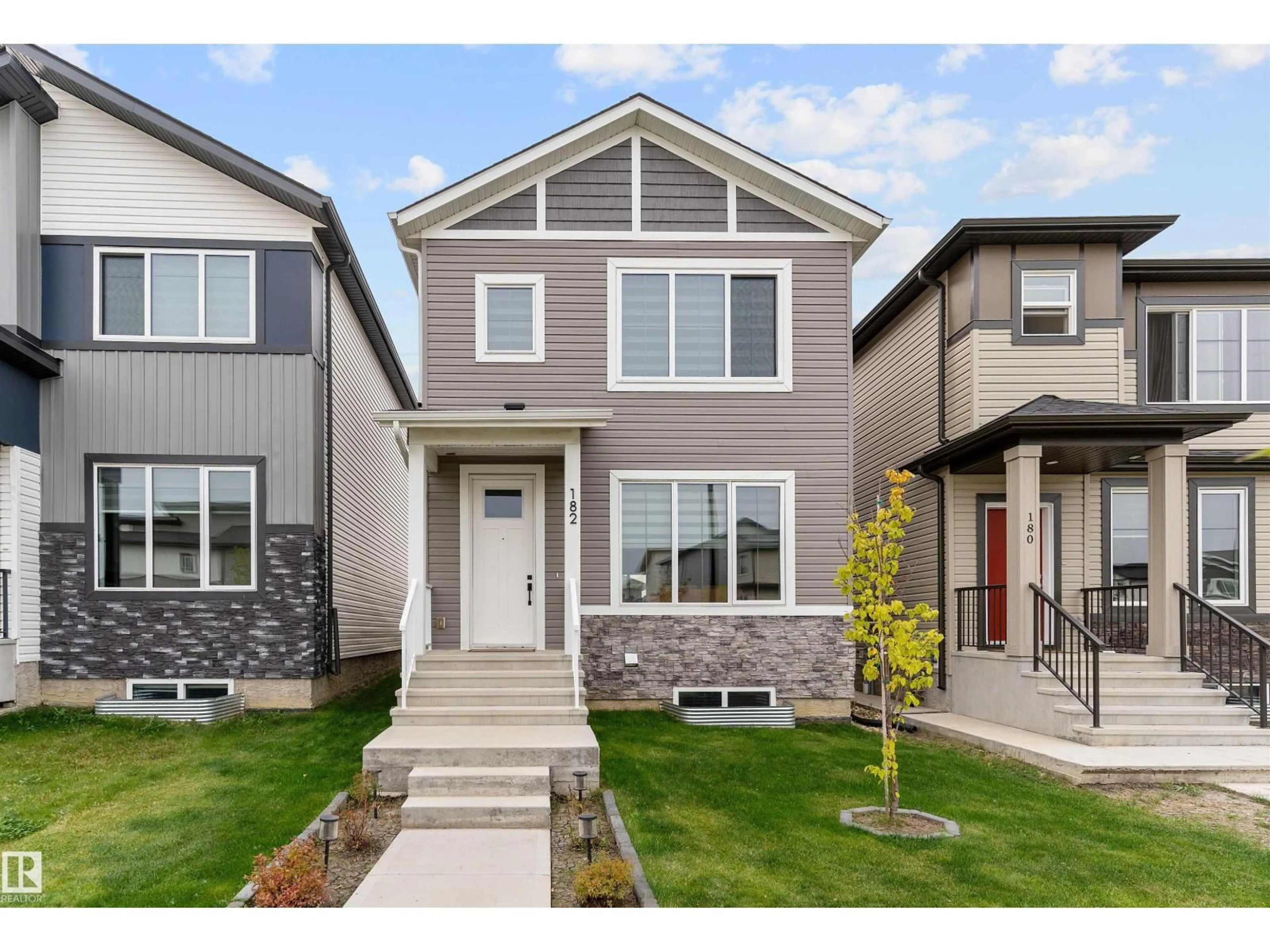 Home with vinyl exterior material, street for 182 CALEDONIA DR, Leduc Alberta T9E0S9
