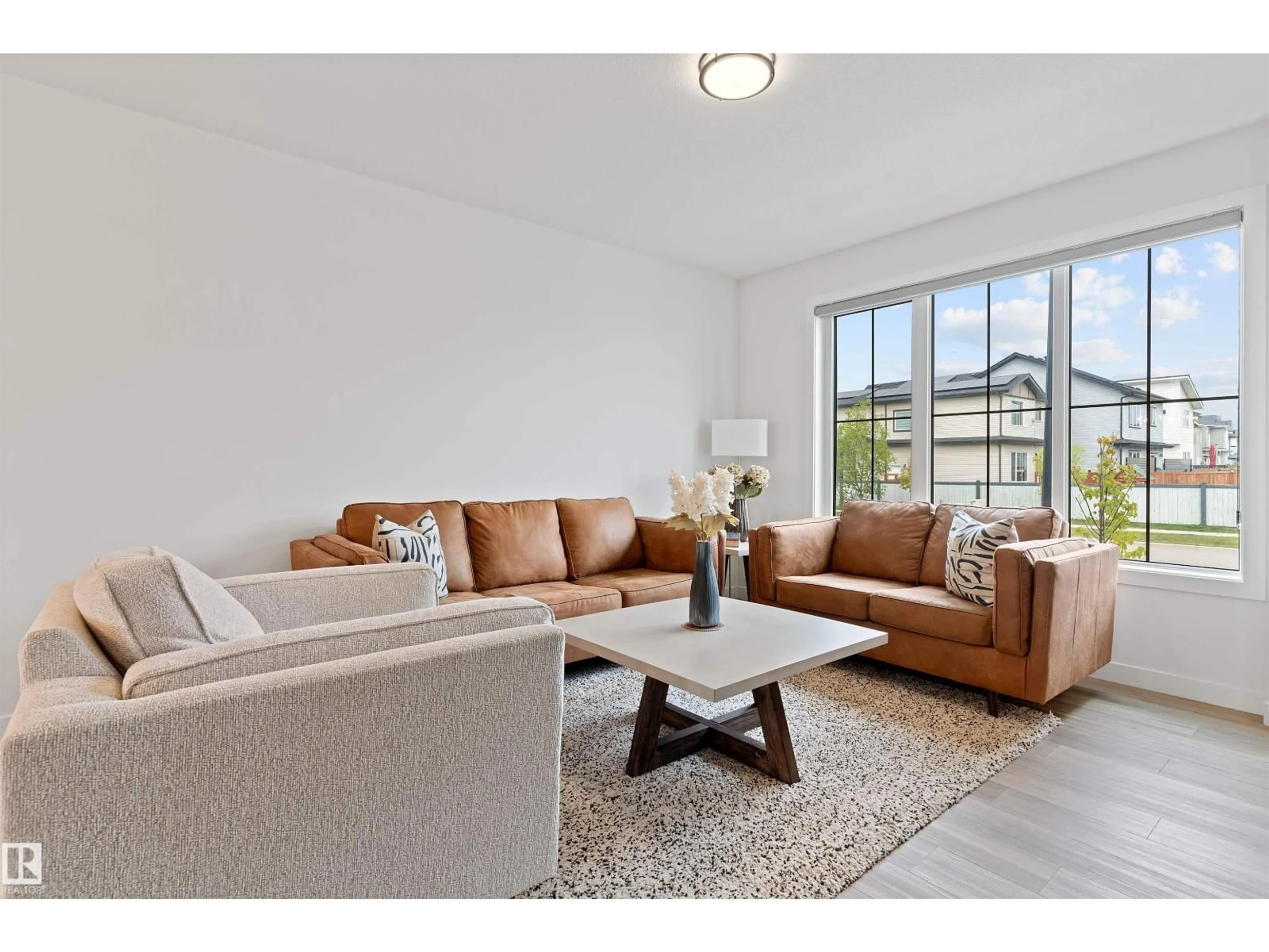 Living room with furniture, unknown for 182 CALEDONIA DR, Leduc Alberta T9E0S9