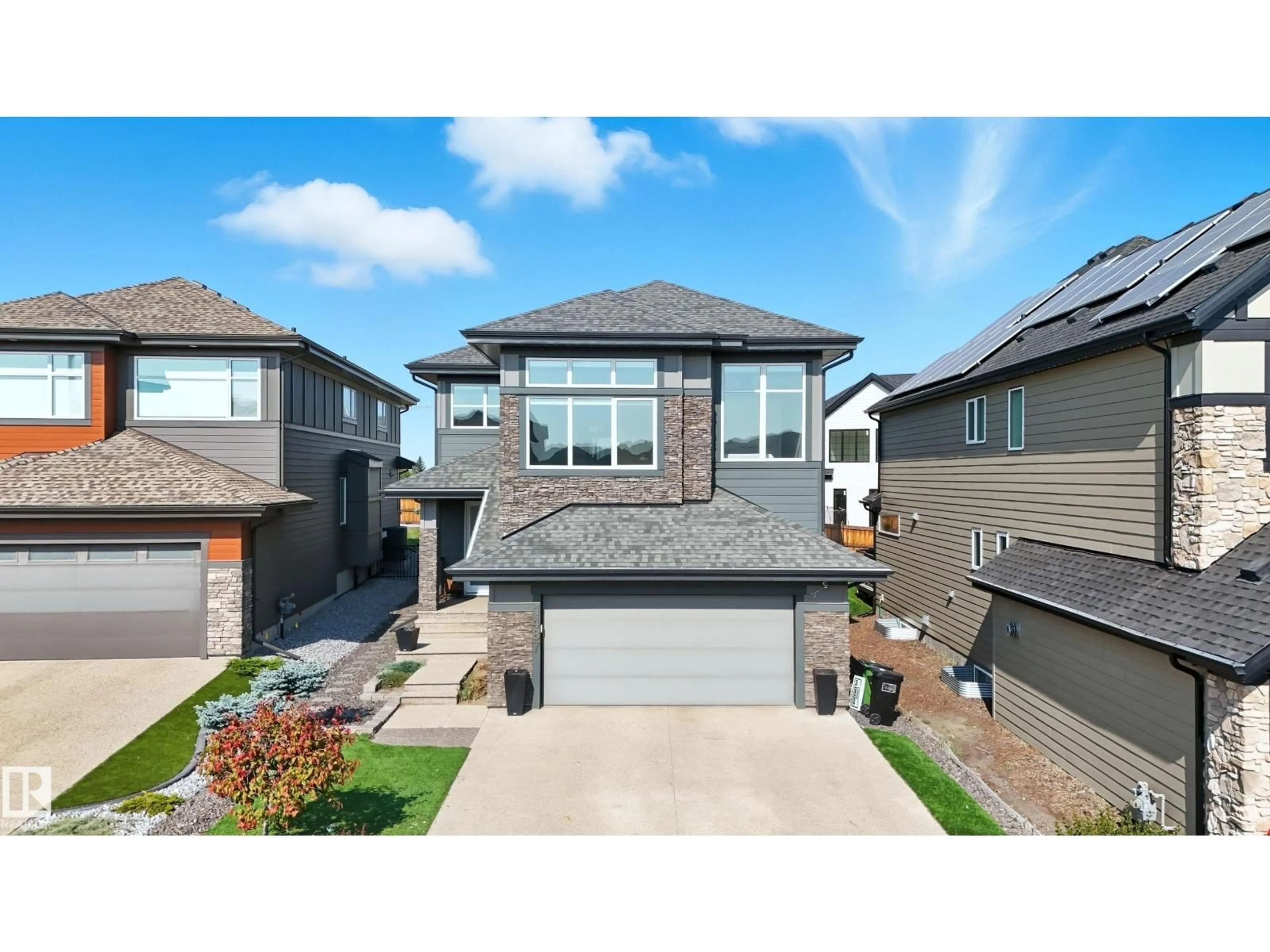 Home with vinyl exterior material, street for 1487 HOWES CR, Edmonton Alberta T6W4G6