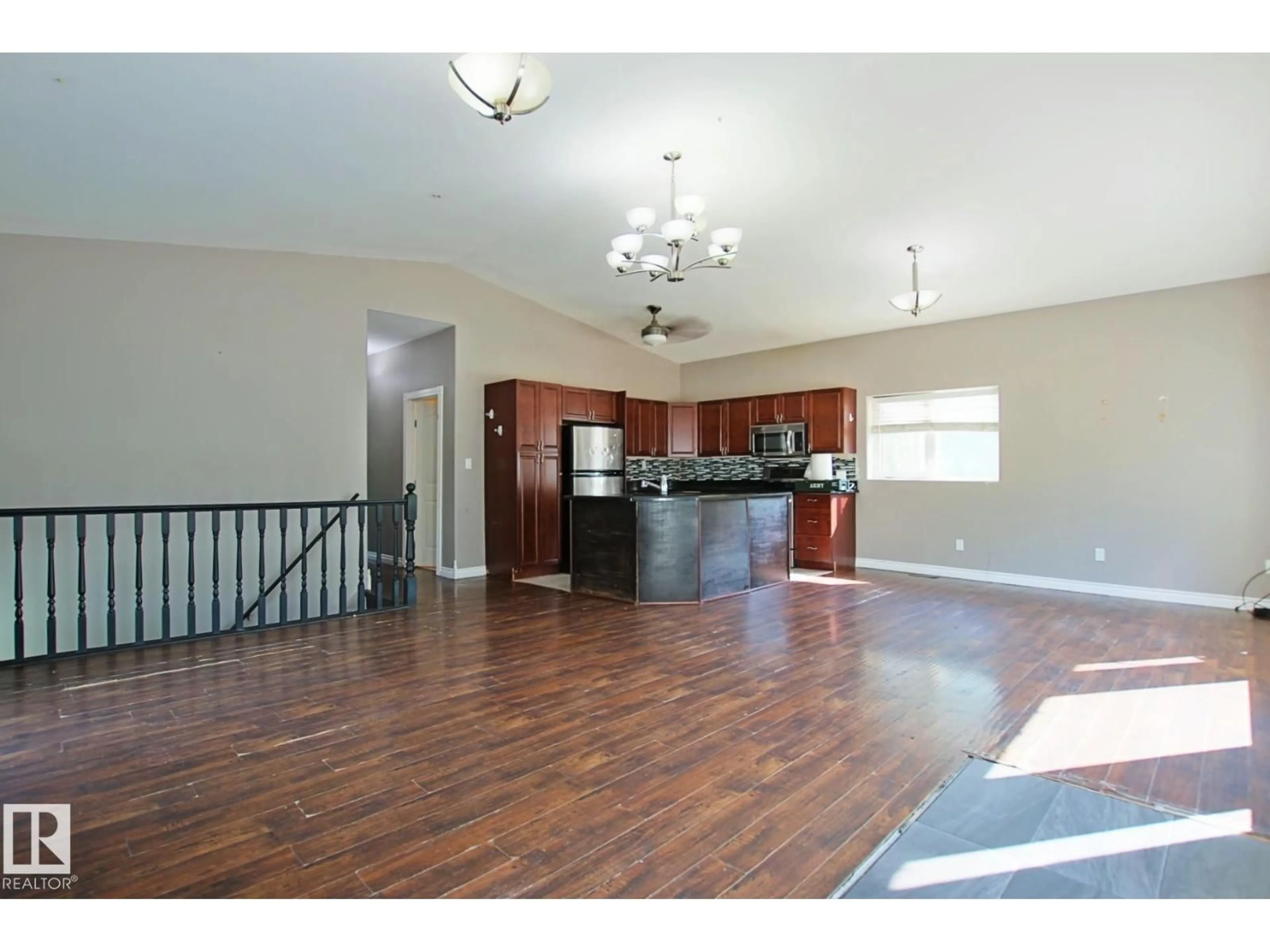 Open concept kitchen, wood/laminate floor for 54402 RGE ROAD 15, Rural Lac Ste. Anne County Alberta T0E1V0