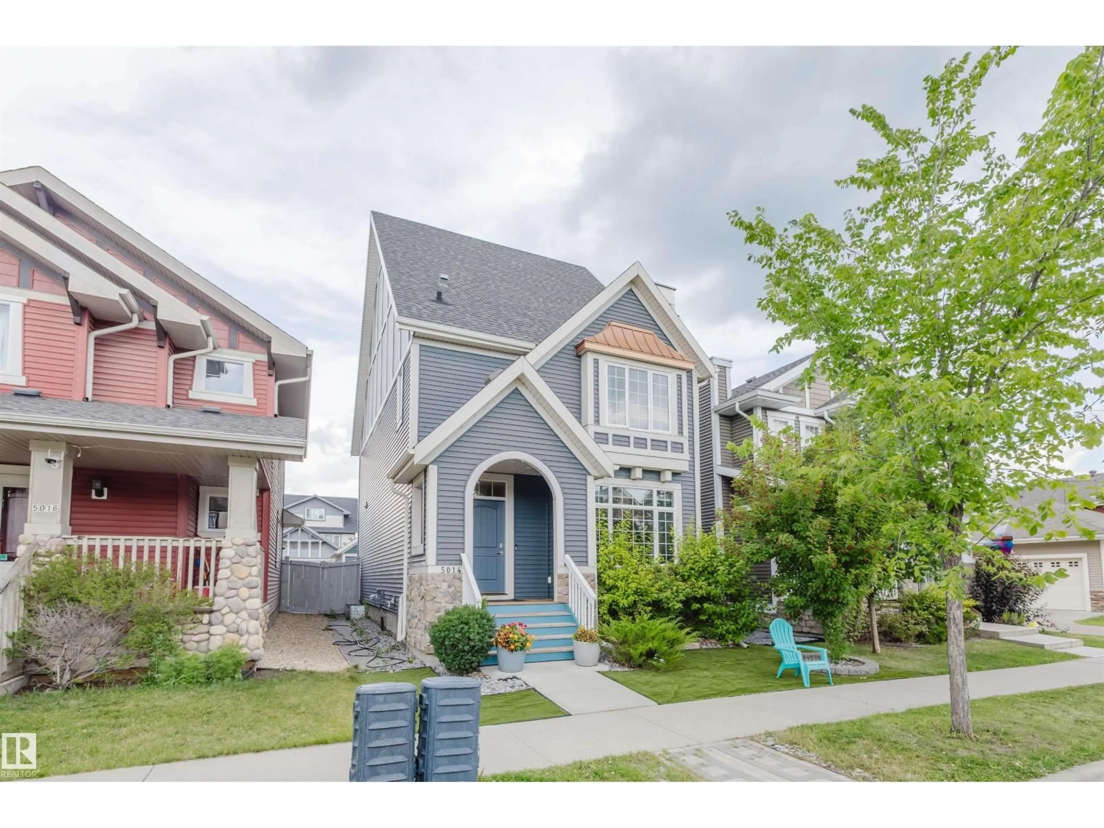 Home with vinyl exterior material, street for 5014 DEWOLF RD, Edmonton Alberta T5E6R4