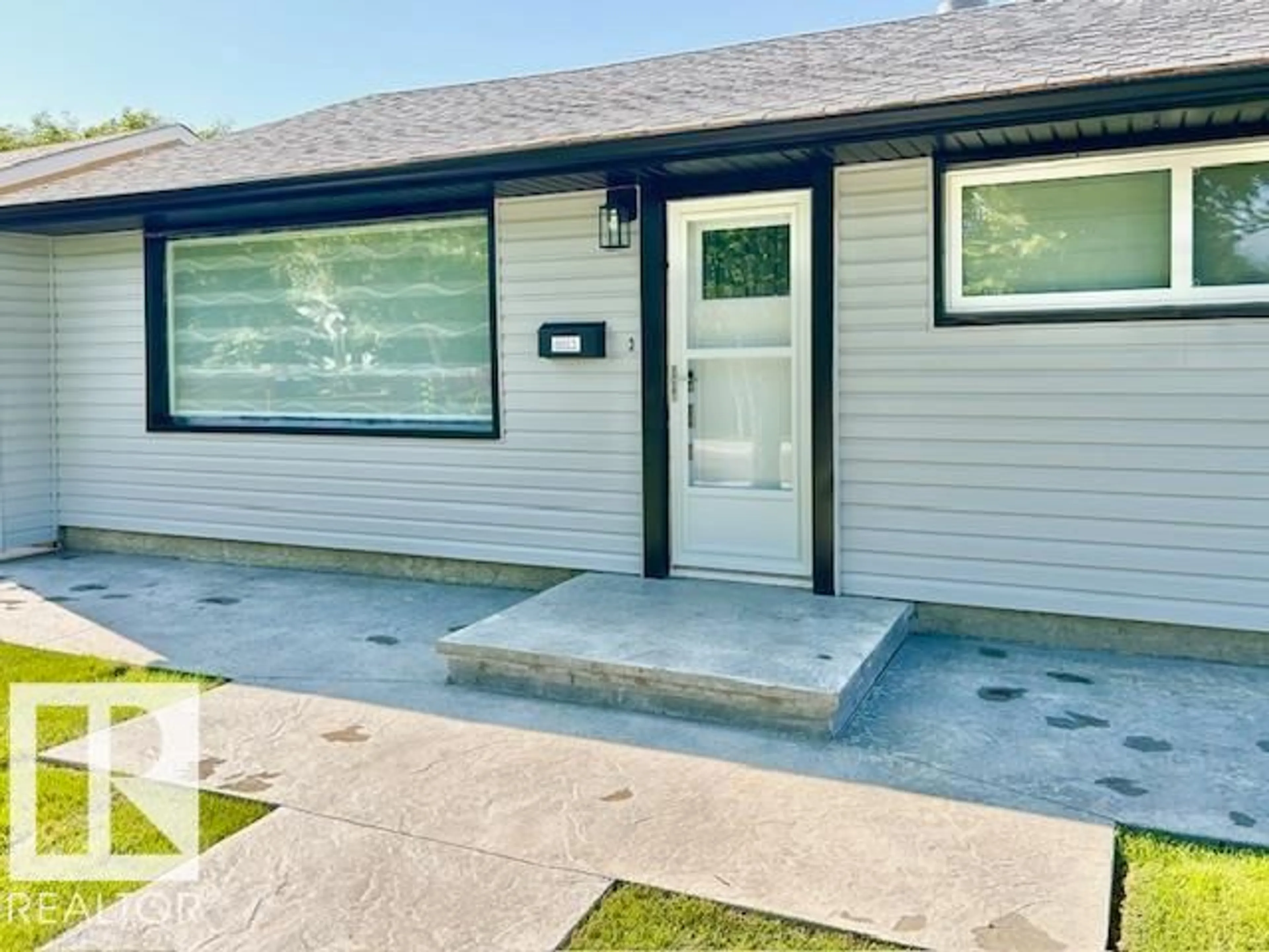 Home with vinyl exterior material, street for NW - 8811 130A AV, Edmonton Alberta T5E0V7