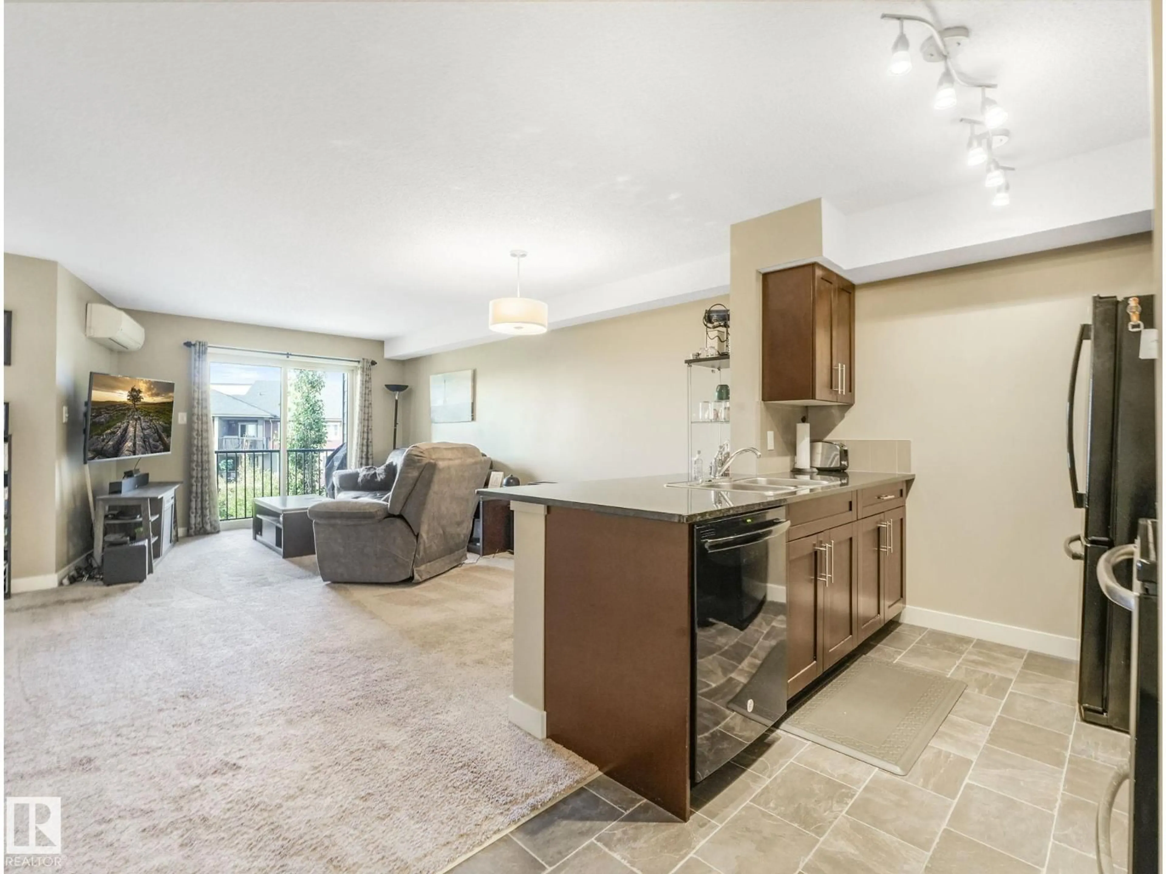 Open concept kitchen, ceramic/tile floor for #413 - 1080 MCCONACHIE BV, Edmonton Alberta T5Y0X2
