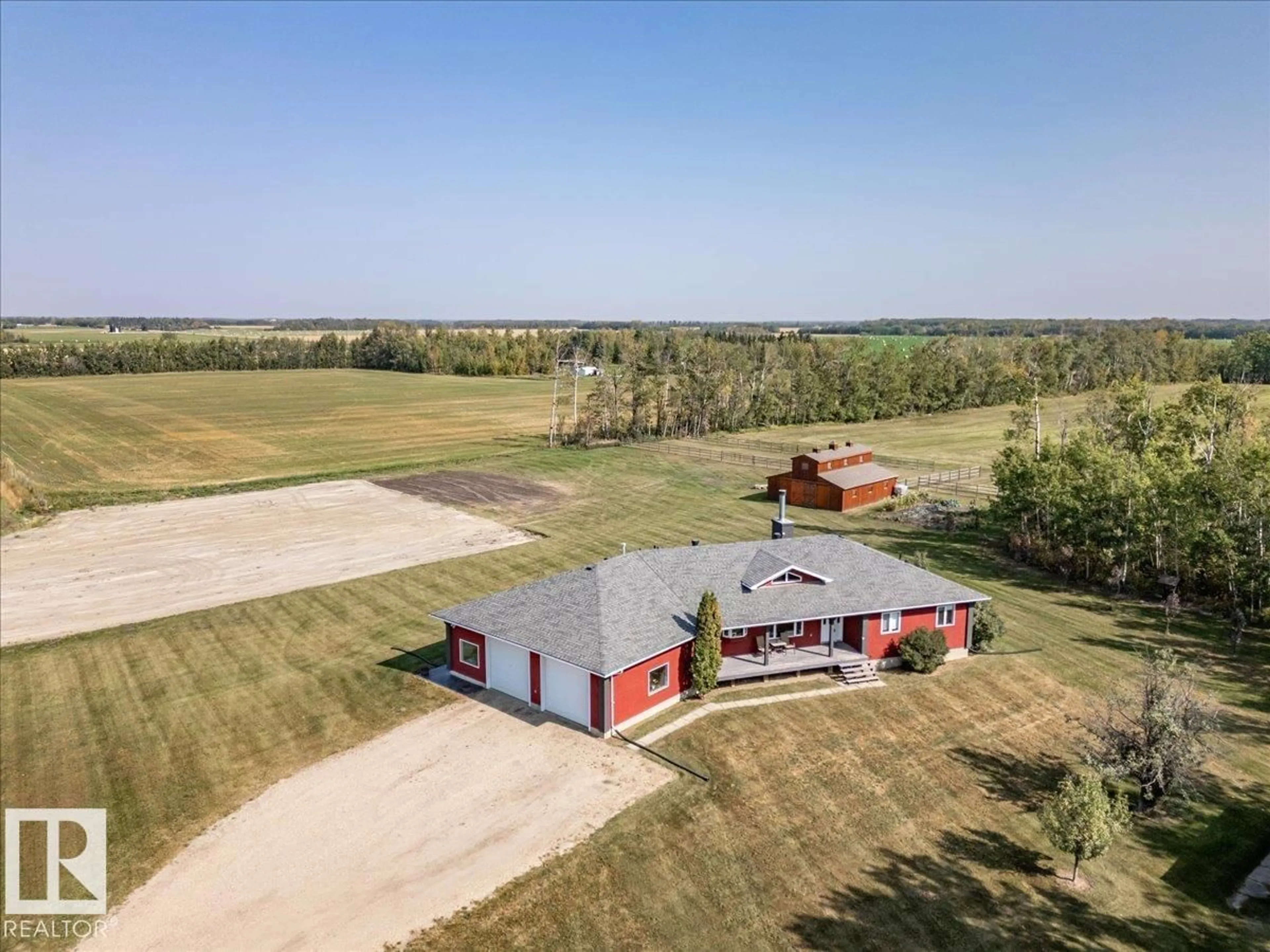 A pic from outside/outdoor area/front of a property/back of a property/a pic from drone, building for 27318 TWP ROAD 482, Rural Leduc County Alberta T0C0V0