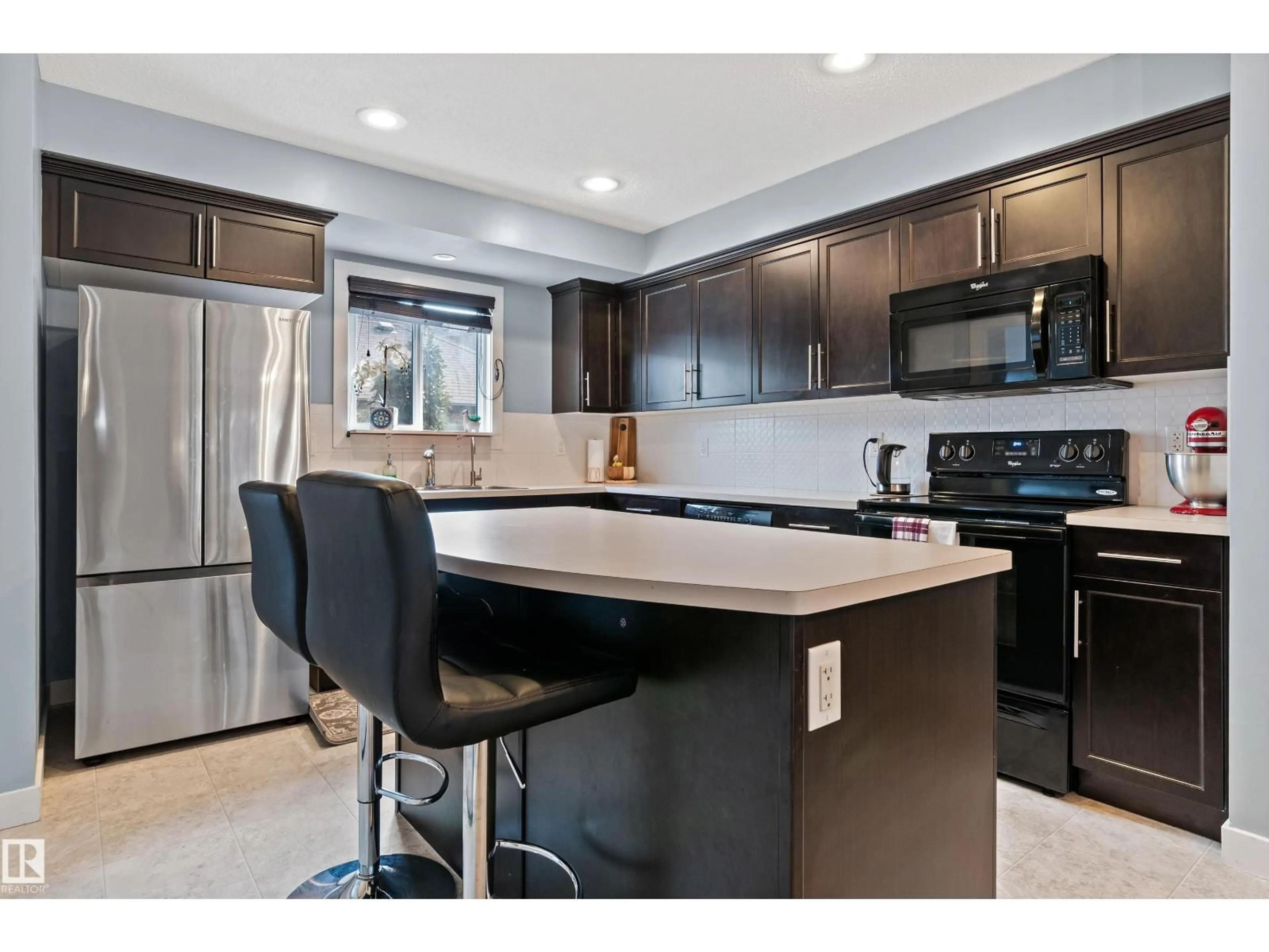 Open concept kitchen, ceramic/tile floor for 327 DESROCHERS BV, Edmonton Alberta T6W3J1