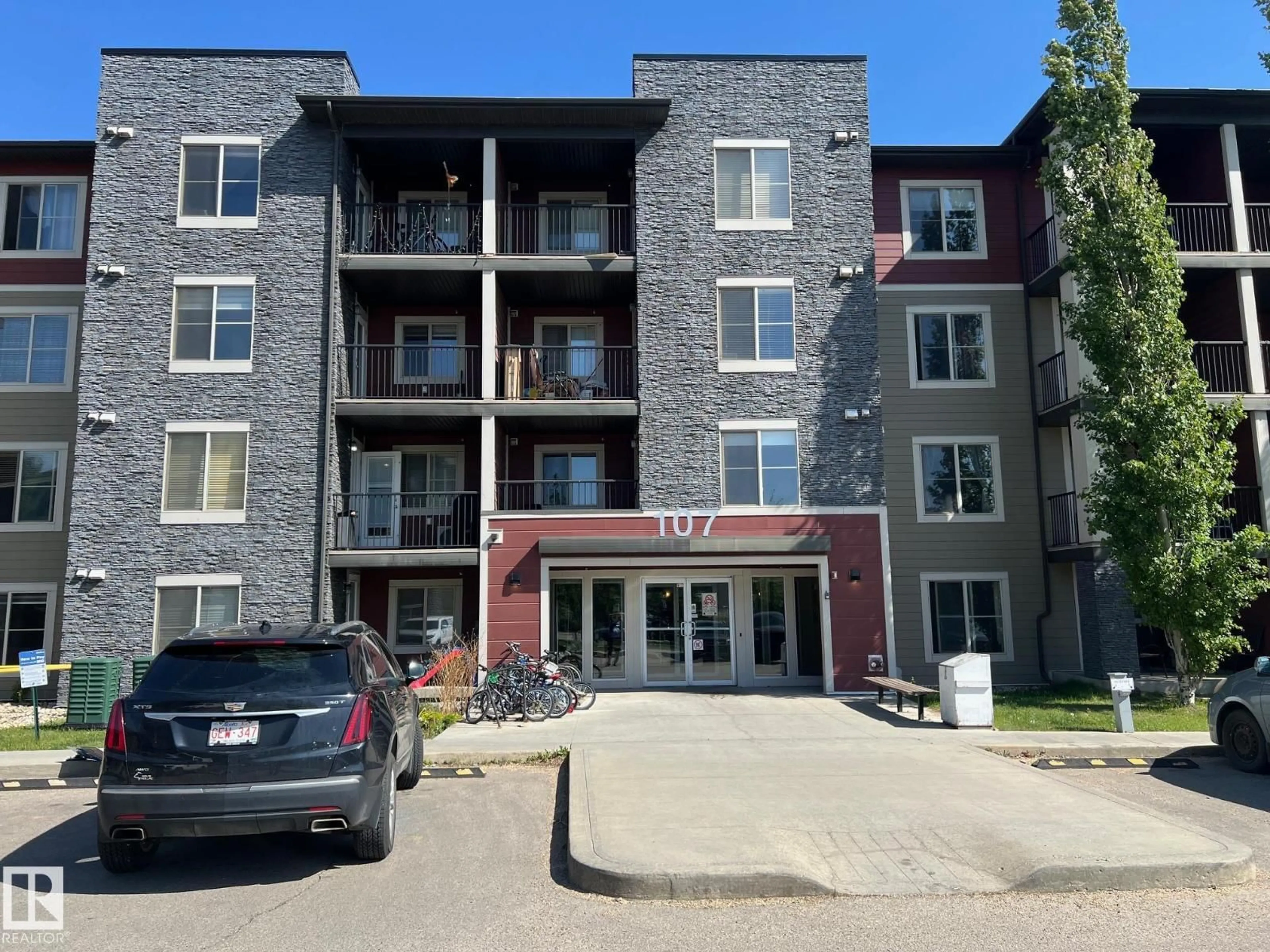 A pic from outside/outdoor area/front of a property/back of a property/a pic from drone, building for 107 - 101 WATT CM, Edmonton Alberta T6X2C6