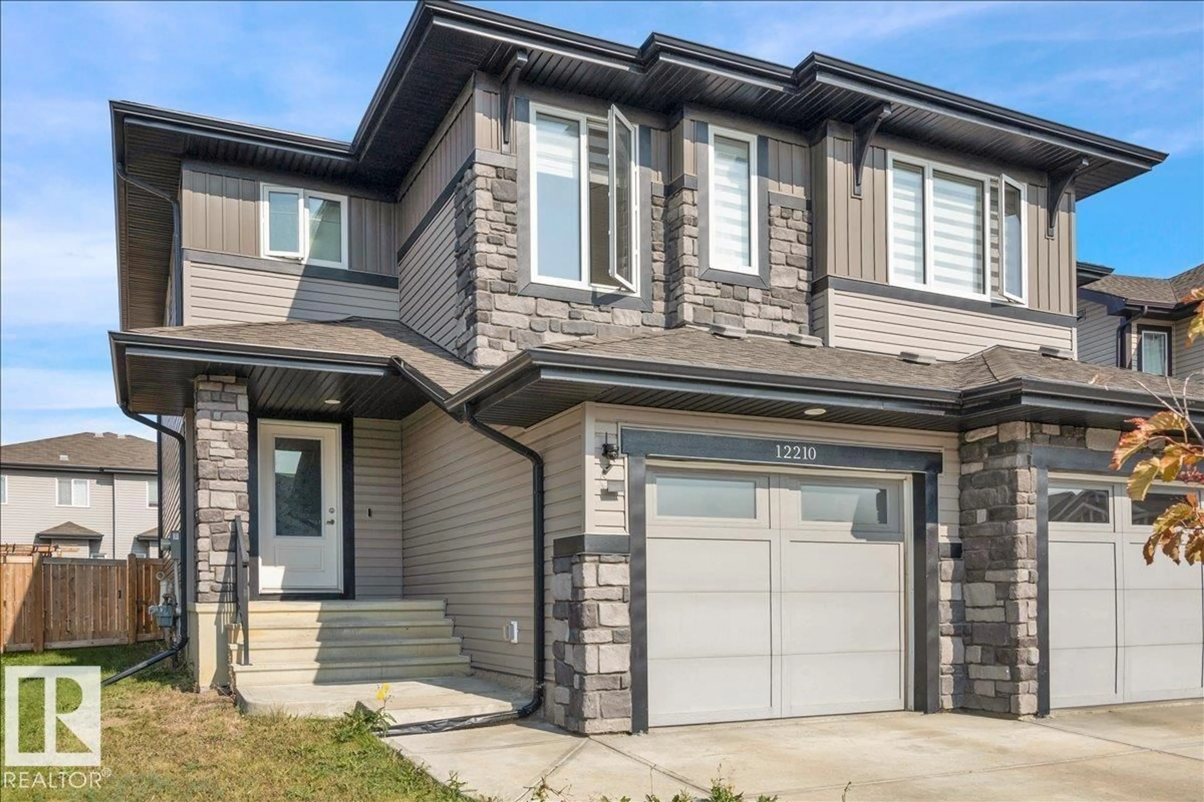 Home with brick exterior material, street for 12210 176 AV, Edmonton Alberta T5X0L2