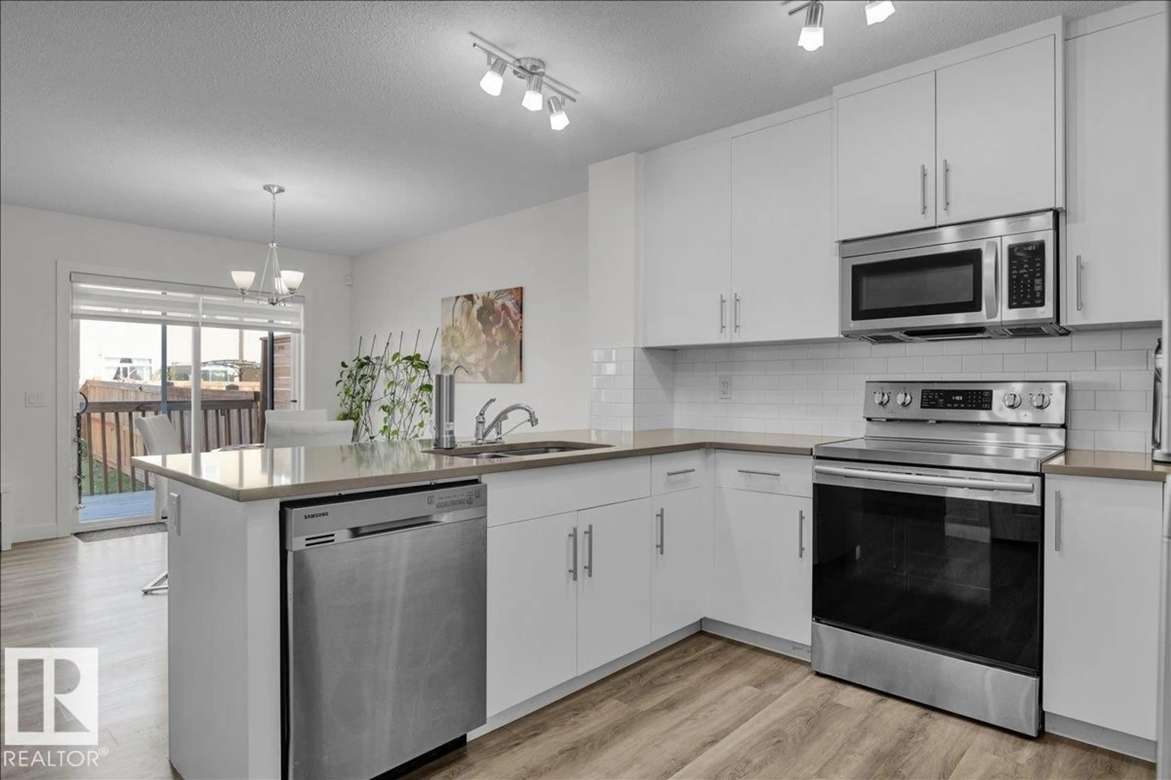 Open concept kitchen, unknown for 12210 176 AV, Edmonton Alberta T5X0L2