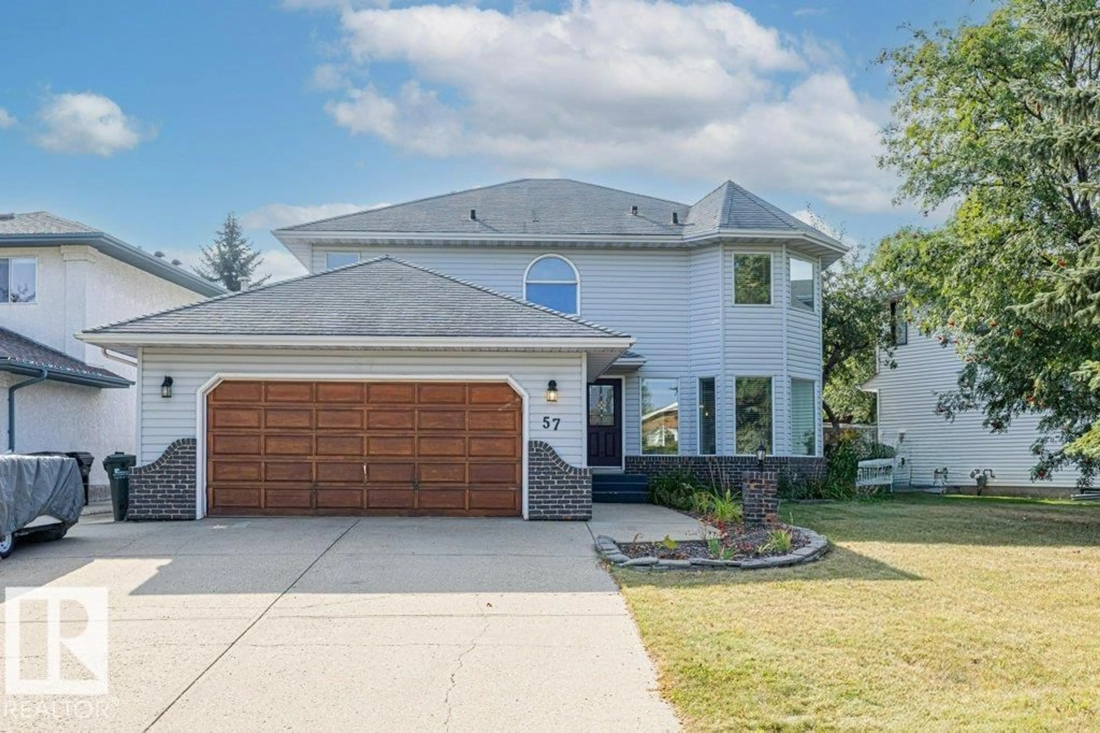 Home with vinyl exterior material, street for 57 CHELSEA WY, Sherwood Park Alberta T8H1C8