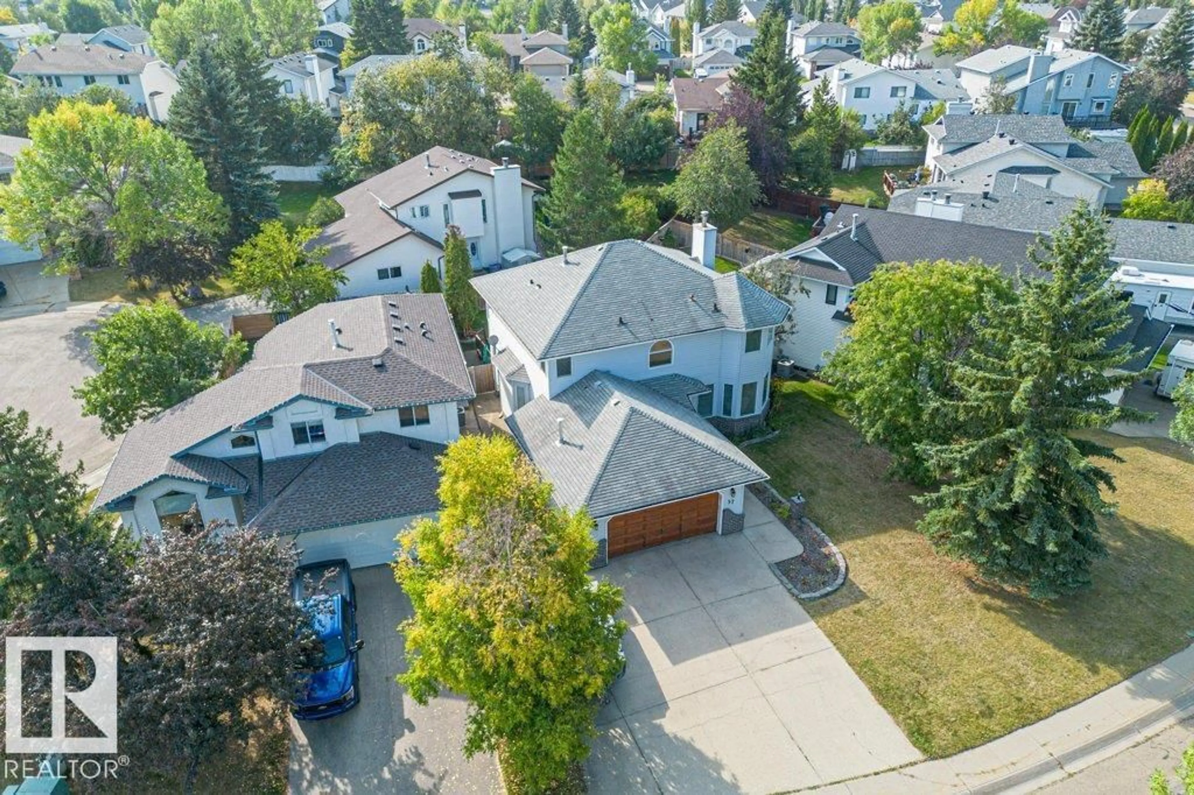 A pic from outside/outdoor area/front of a property/back of a property/a pic from drone, street for 57 CHELSEA WY, Sherwood Park Alberta T8H1C8