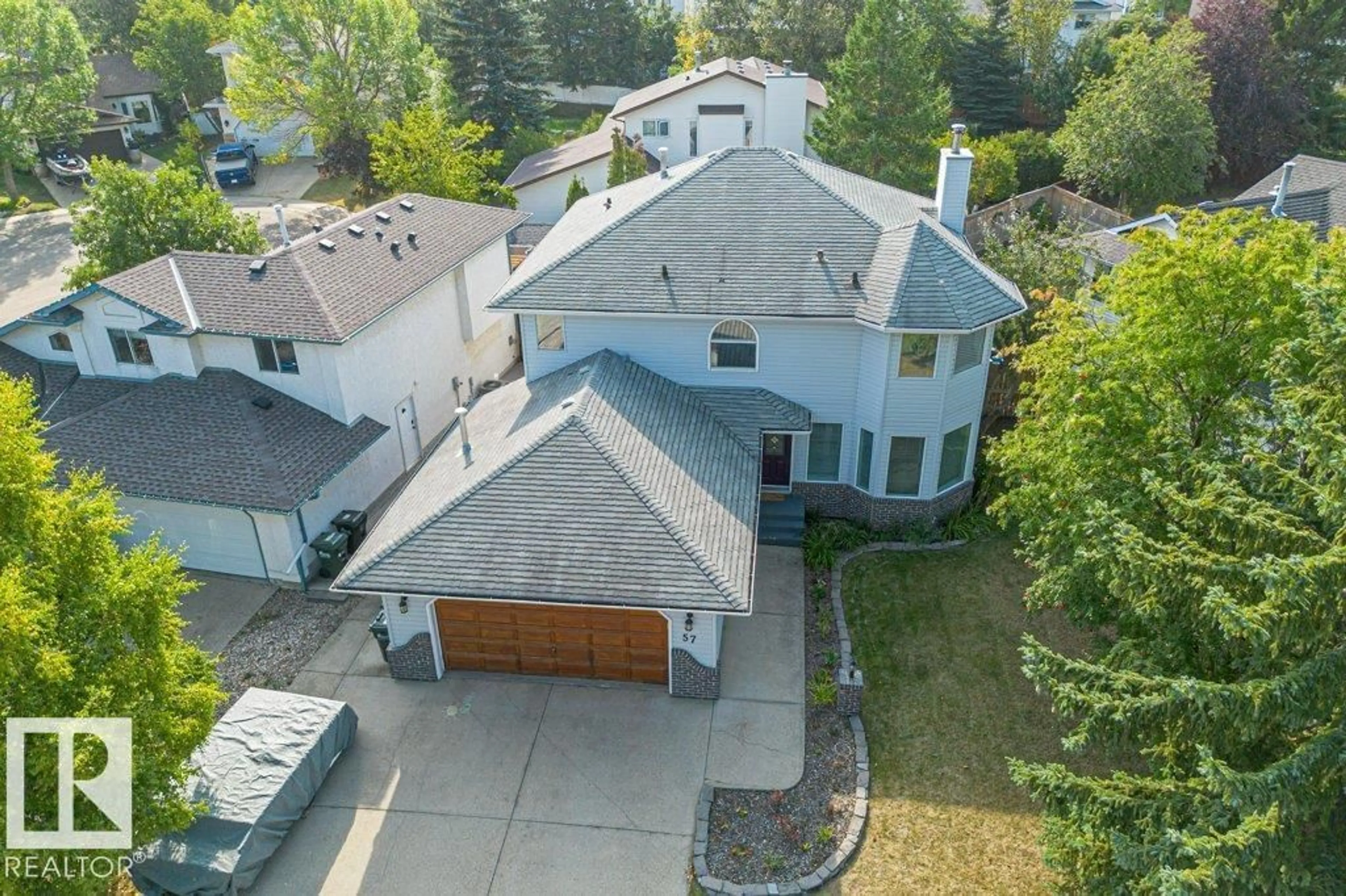 A pic from outside/outdoor area/front of a property/back of a property/a pic from drone, street for 57 CHELSEA WY, Sherwood Park Alberta T8H1C8