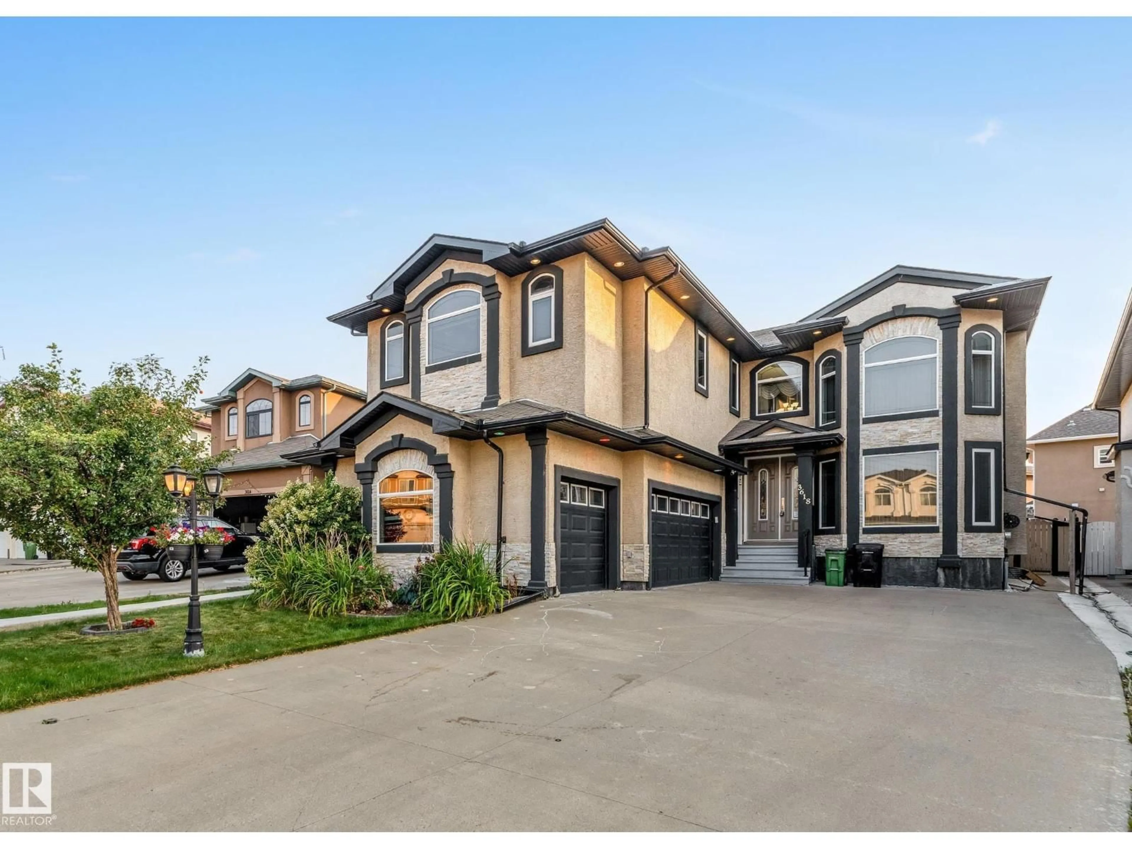 Home with vinyl exterior material, street for NW - 3618 28A ST, Edmonton Alberta T6T1N4
