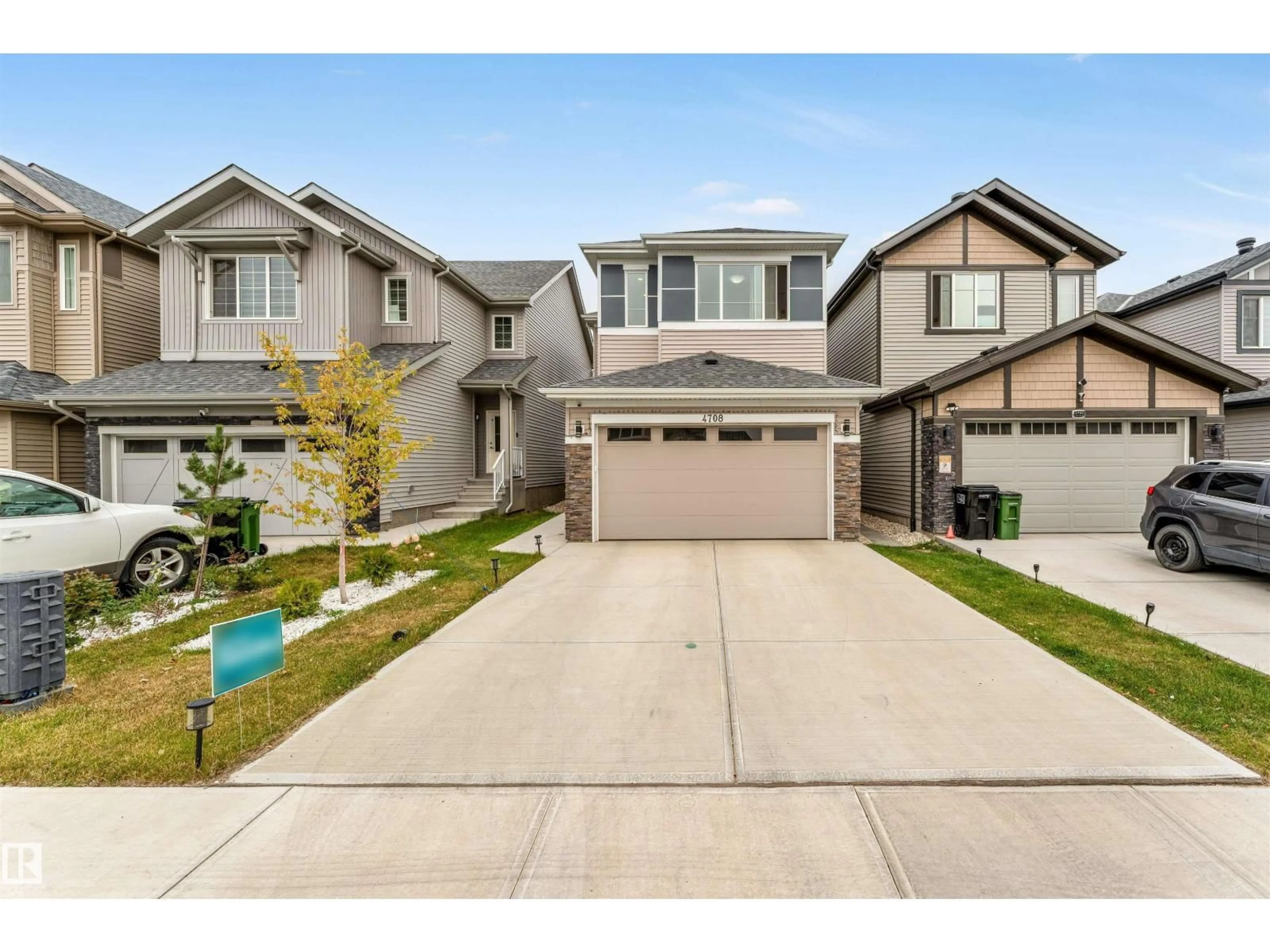 Home with vinyl exterior material, street for NW - 4708 177 AV, Edmonton Alberta T5Y4G4