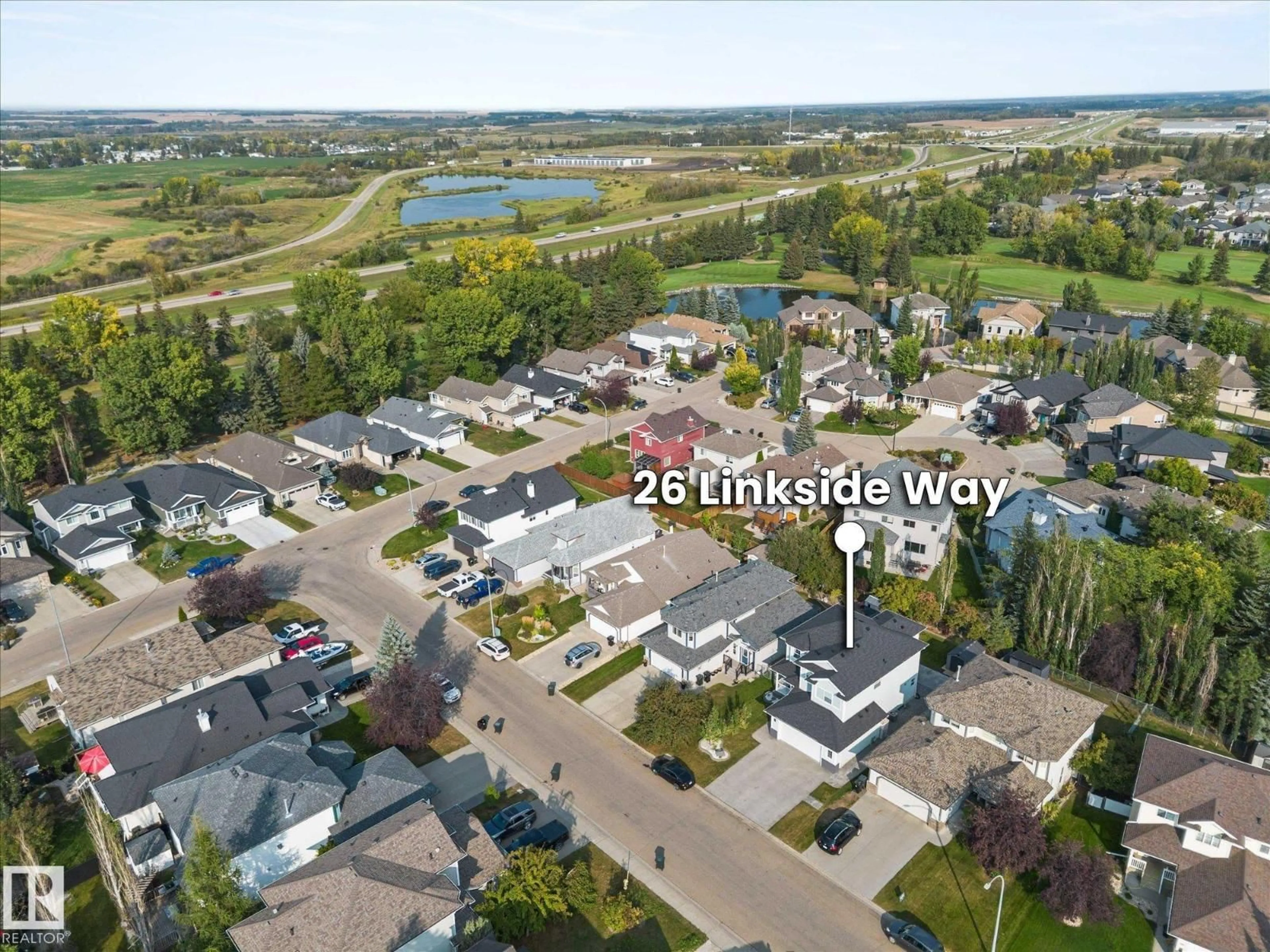 A pic from outside/outdoor area/front of a property/back of a property/a pic from drone, water/lake/river/ocean view for 26 LINKSIDE WY, Spruce Grove Alberta T7X4L5