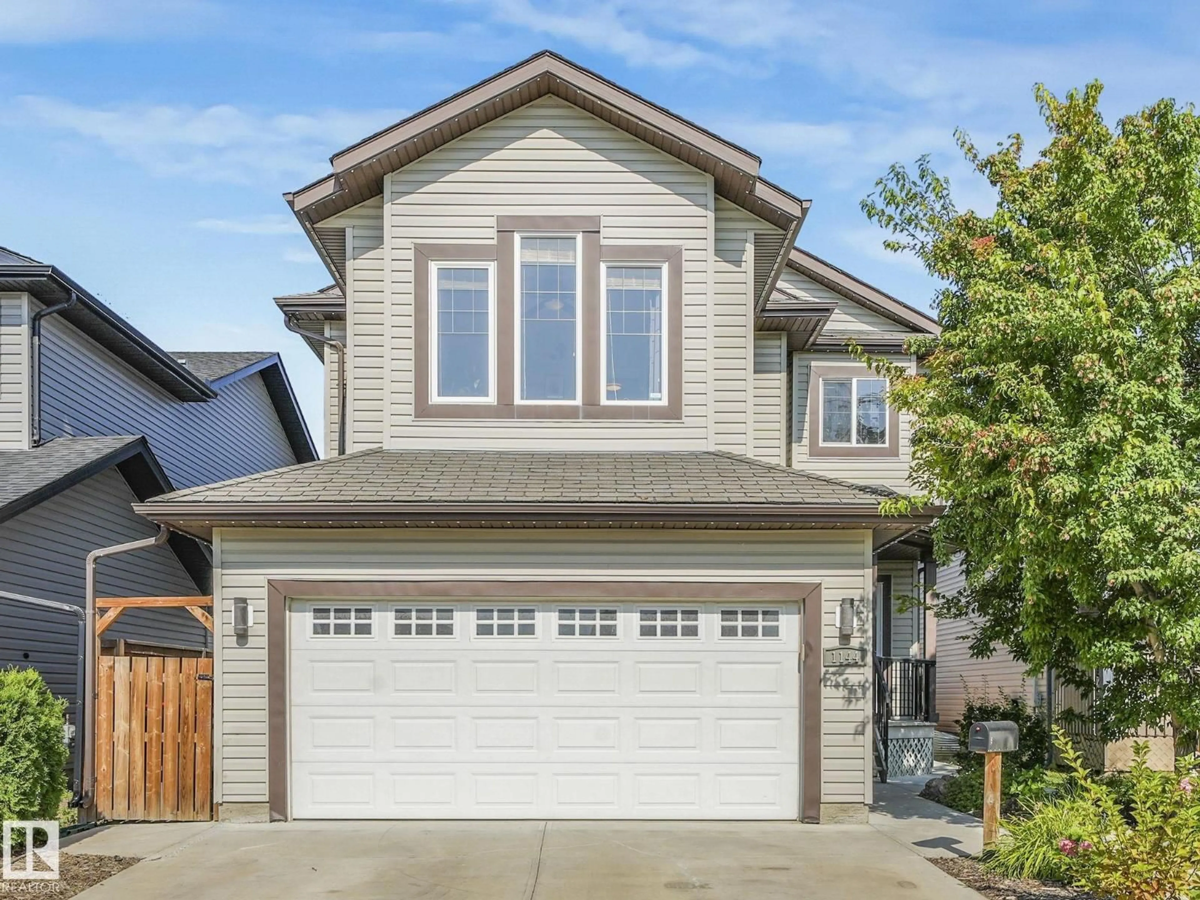 Home with vinyl exterior material, street for 1144 WESTERRA LI, Stony Plain Alberta T7Z2Z4