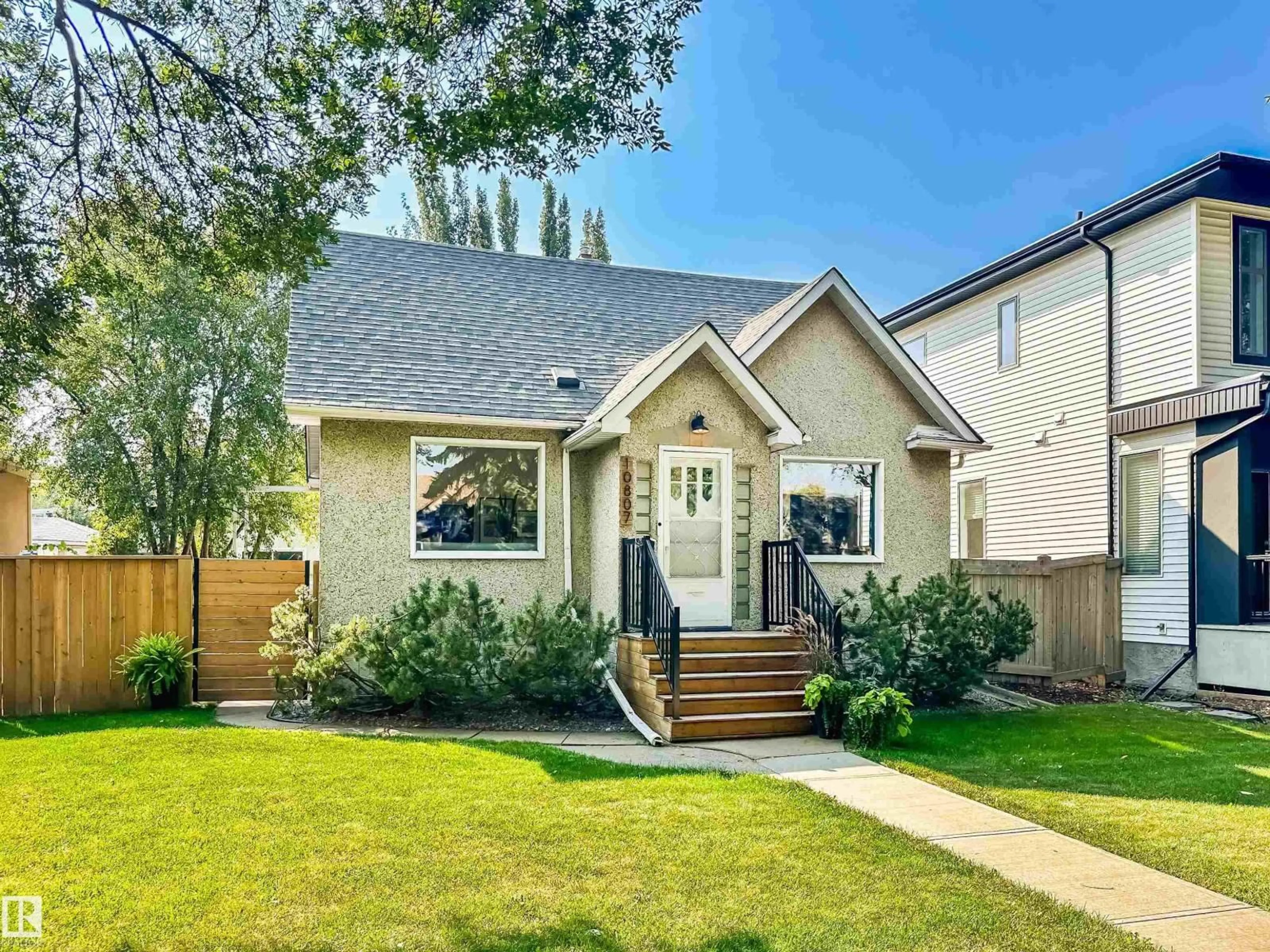 Home with vinyl exterior material, street for 10807 63 AV, Edmonton Alberta T6H1P9