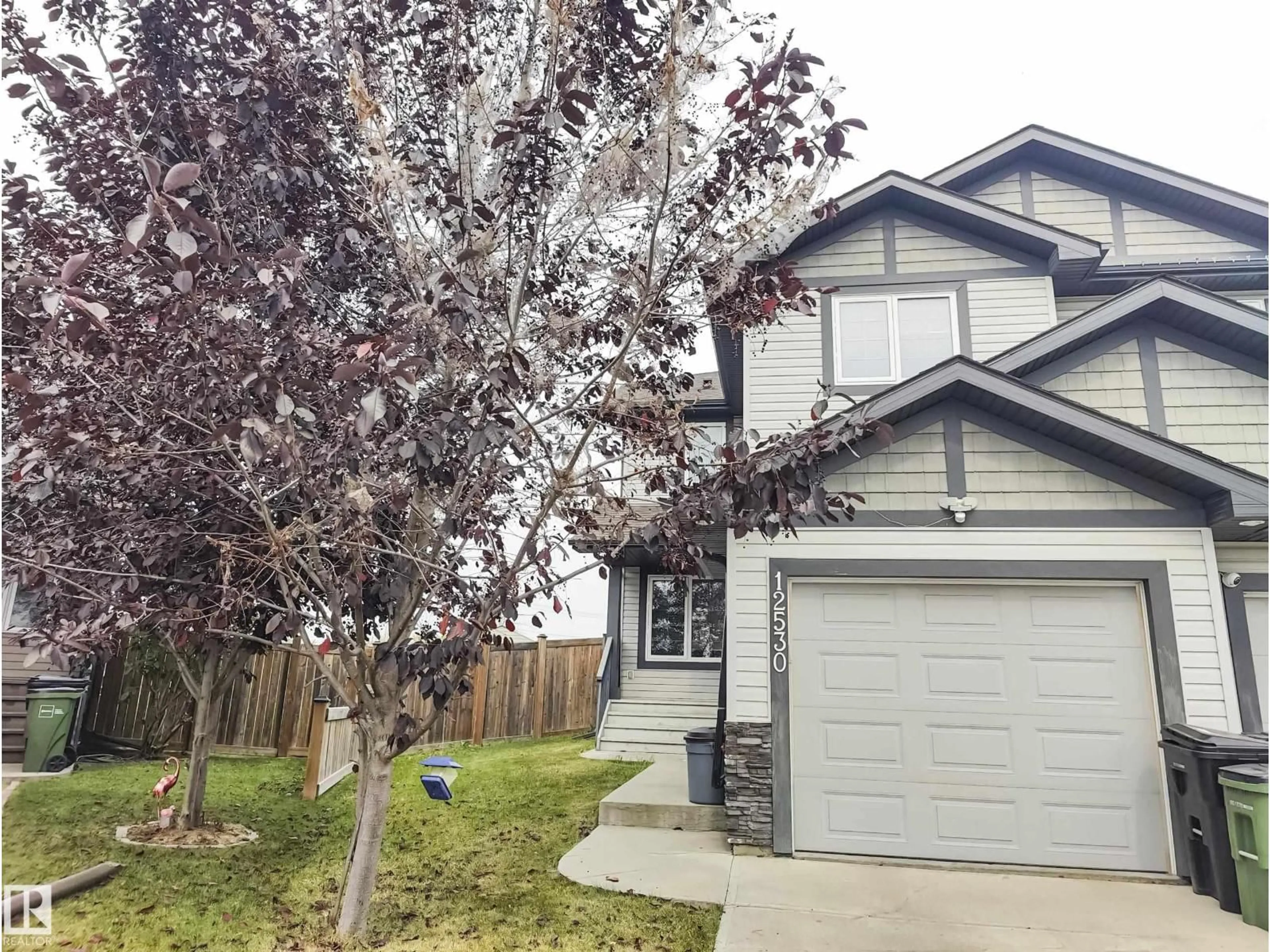 Home with vinyl exterior material, street for 12530 172 AV, Edmonton Alberta T5X0E6
