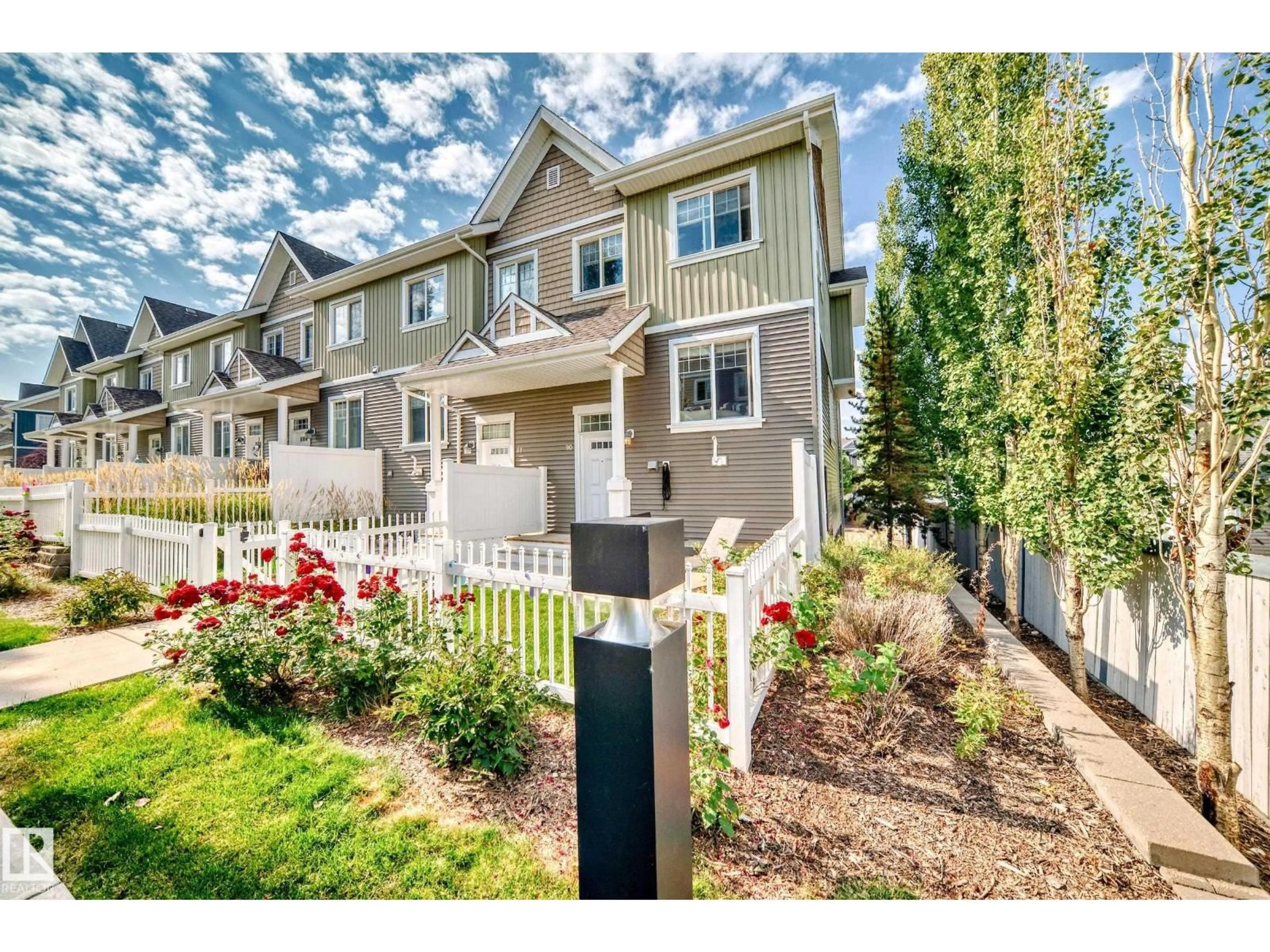 A pic from outside/outdoor area/front of a property/back of a property/a pic from drone, street for 4050 - 90 SAVARYN DR, Edmonton Alberta T6X1R8