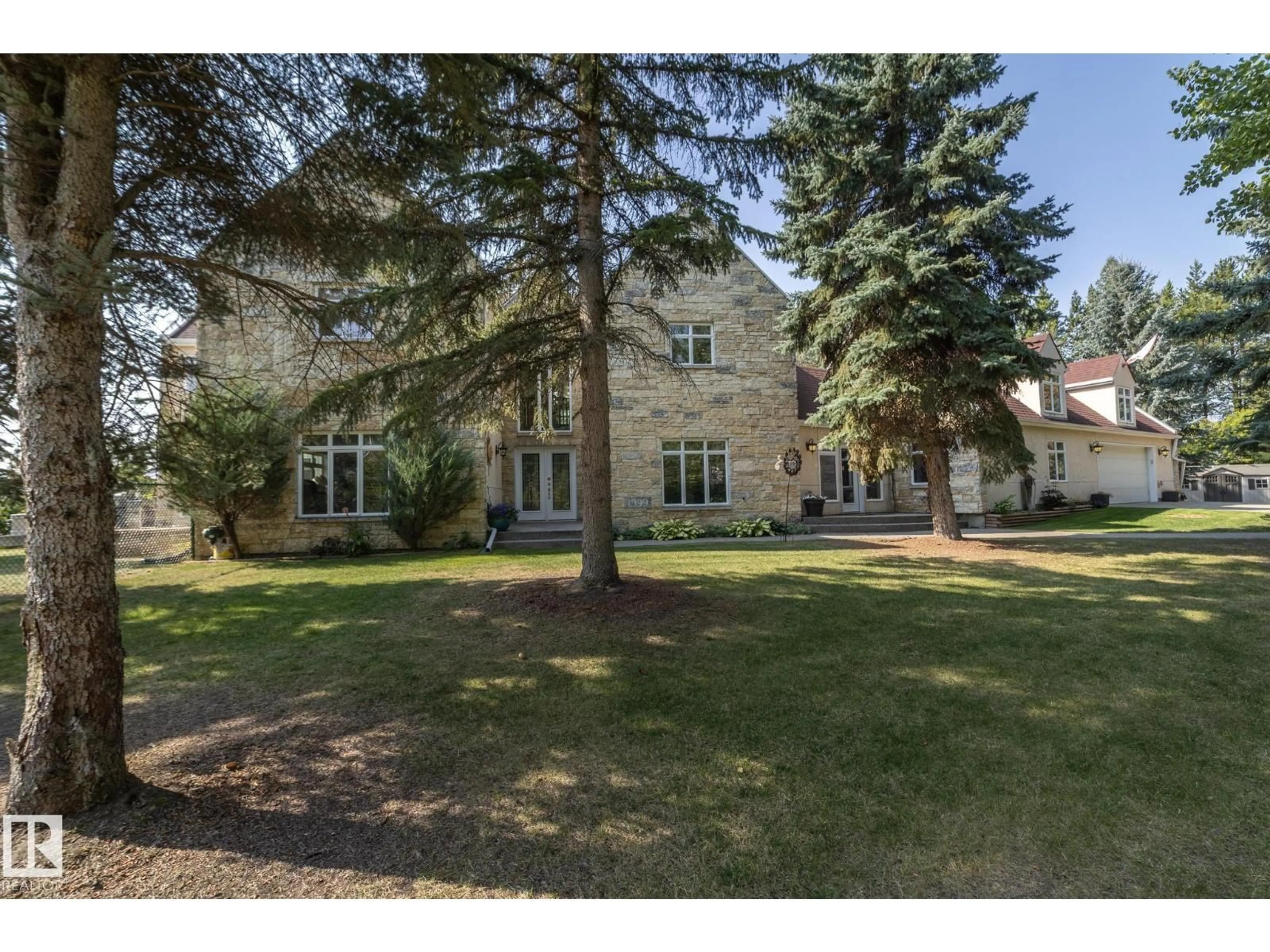 A pic from outside/outdoor area/front of a property/back of a property/a pic from drone, street for #12 - 27107 TWP ROAD 510, Rural Parkland County Alberta T7Y1H6