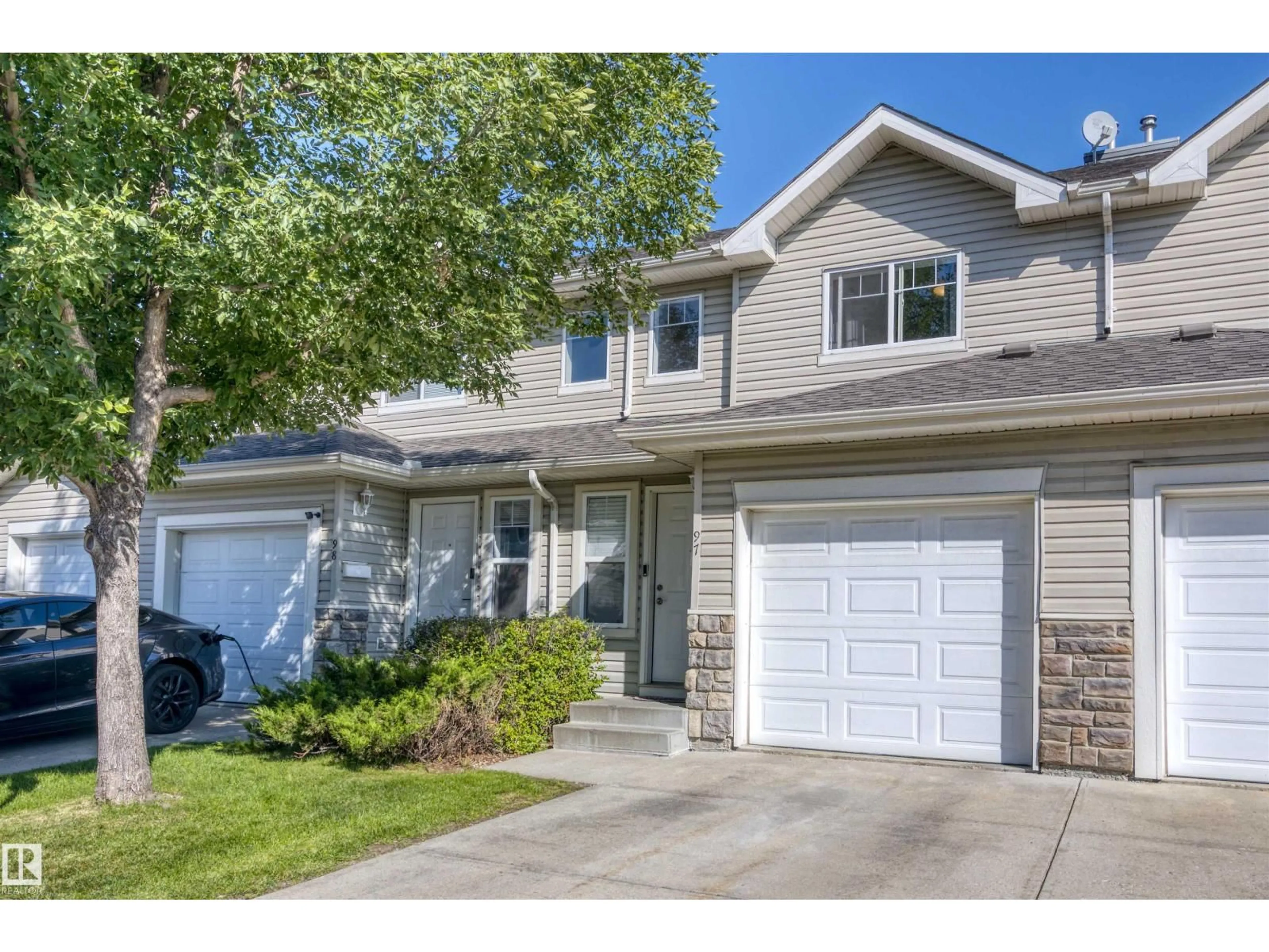 Home with vinyl exterior material, street for #97 - 230 EDWARDS DR, Edmonton Alberta T6X1G7