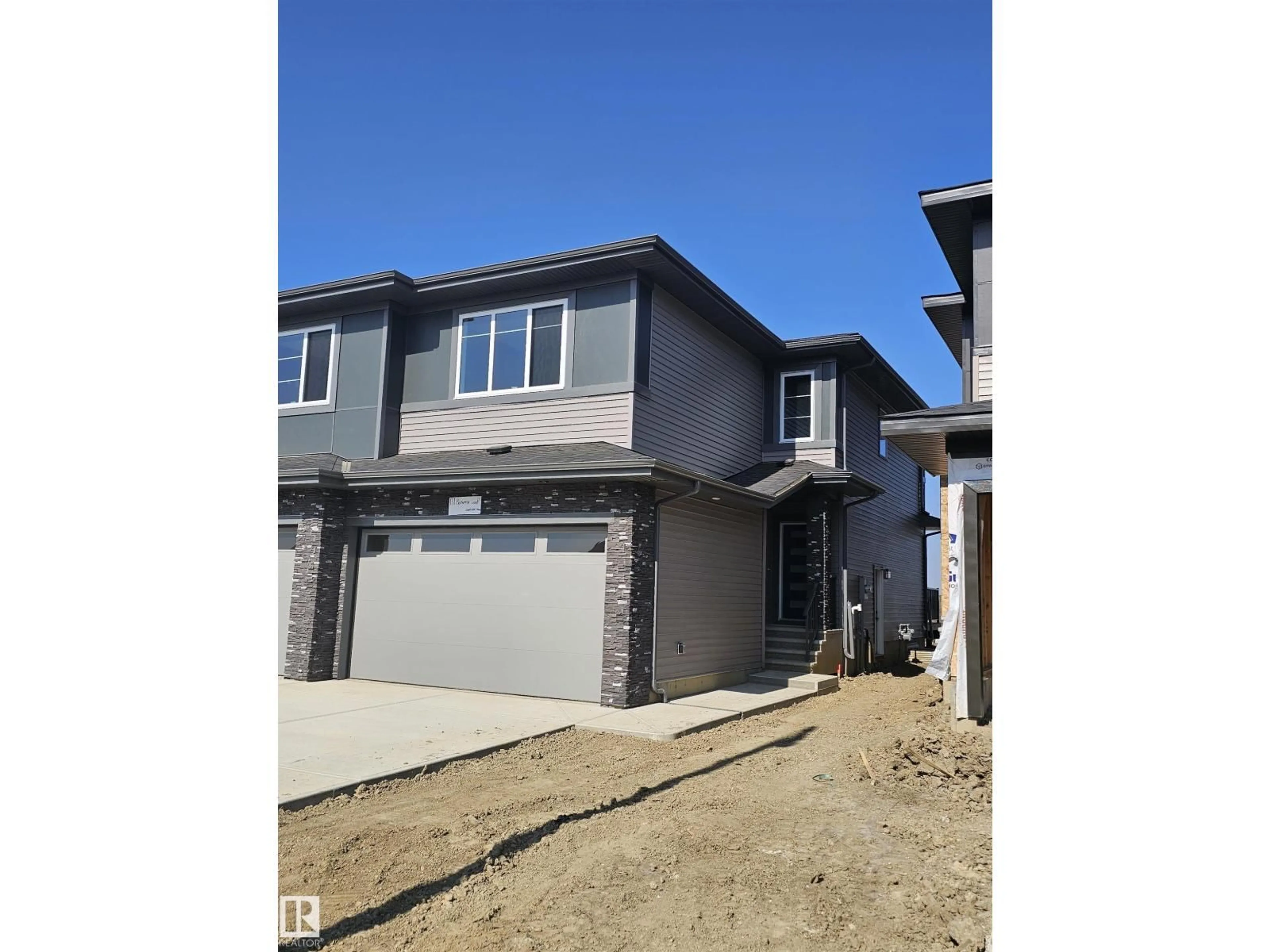 Home with vinyl exterior material, street for 131 PIERWYCK LO, Spruce Grove Alberta T7X3H1
