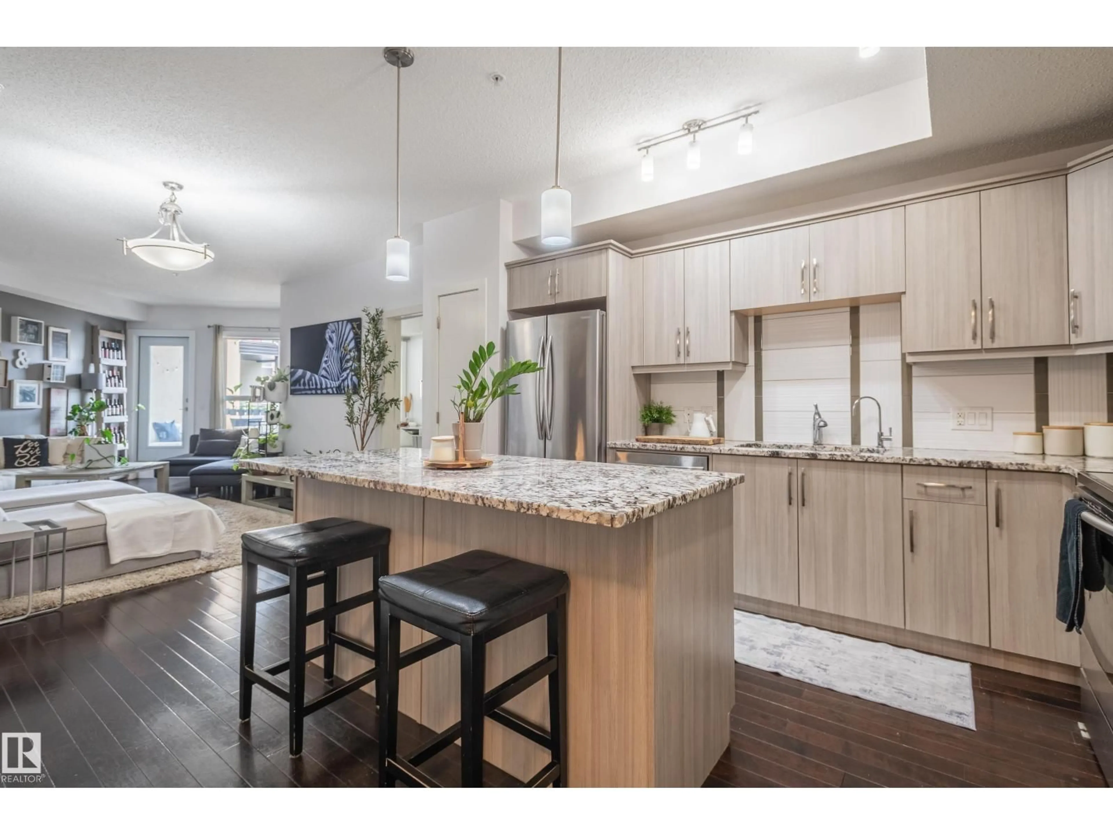 Open concept kitchen, wood/laminate floor for #305 - 10523 123 ST, Edmonton Alberta T5N1N9