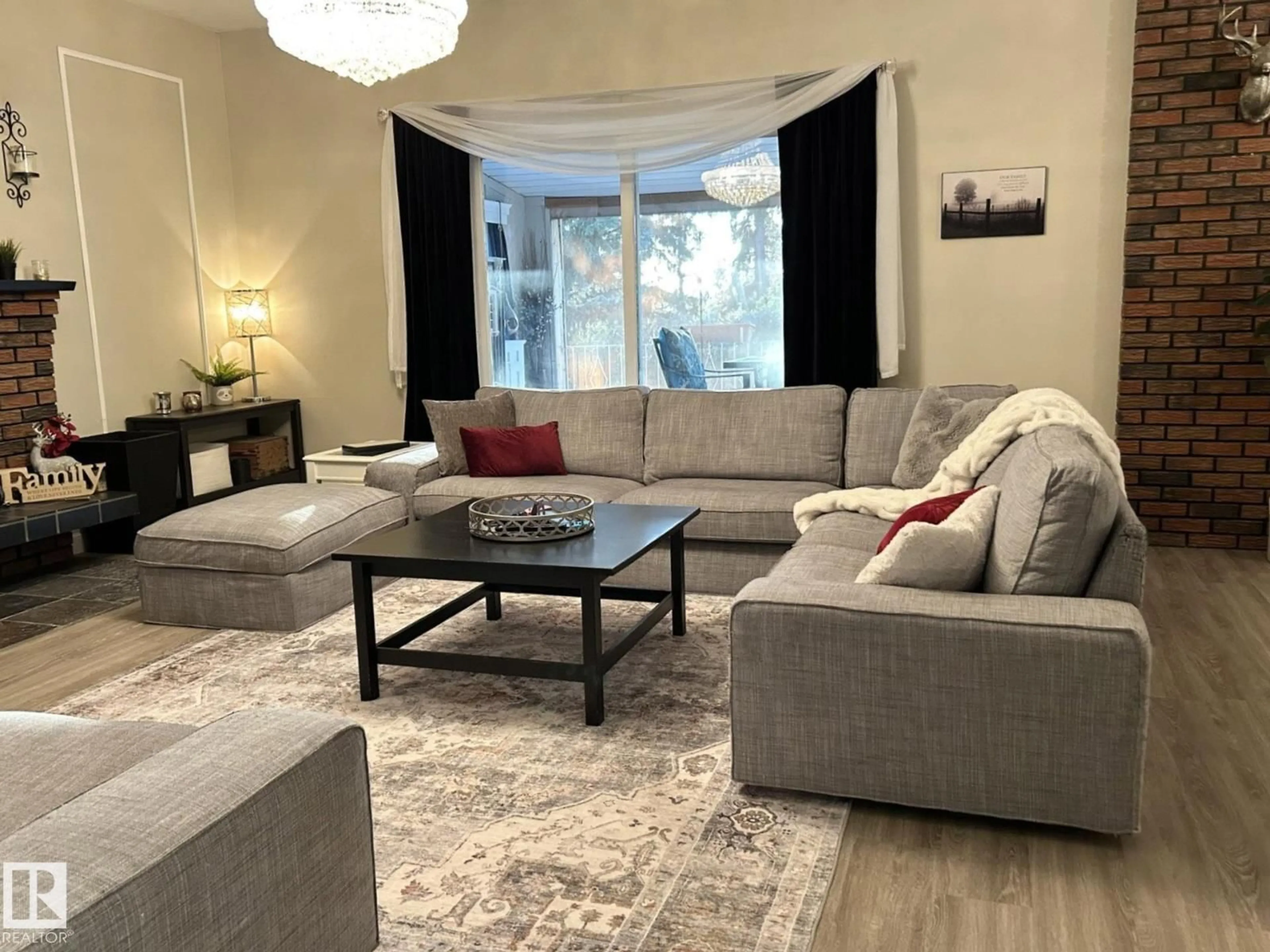 Living room with furniture, unknown for 4102 48A ST, Vegreville Alberta T9C1B3