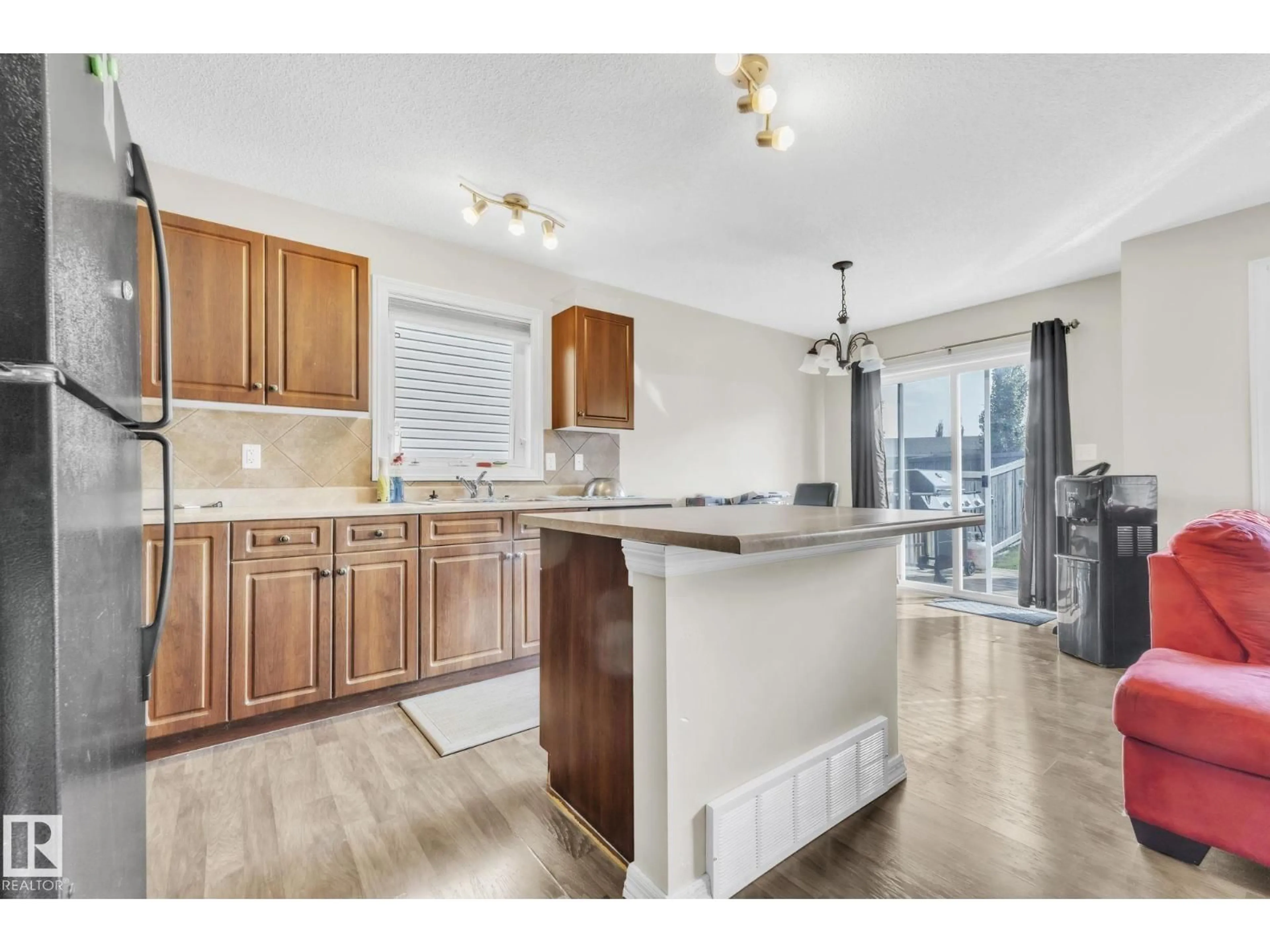 Open concept kitchen, unknown for 140 CALVERT WD, Fort Saskatchewan Alberta T8L0E6