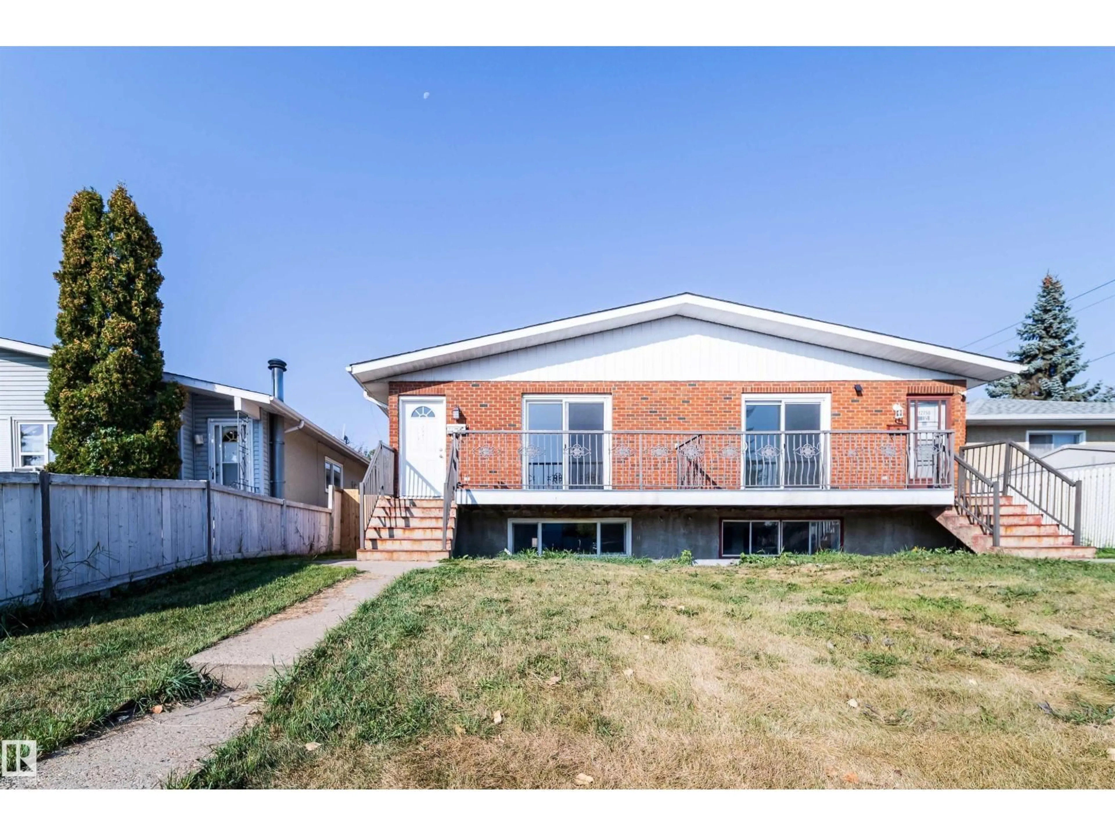 Home with brick exterior material, street for 12748/50 85 ST, Edmonton Alberta T5E2Y7