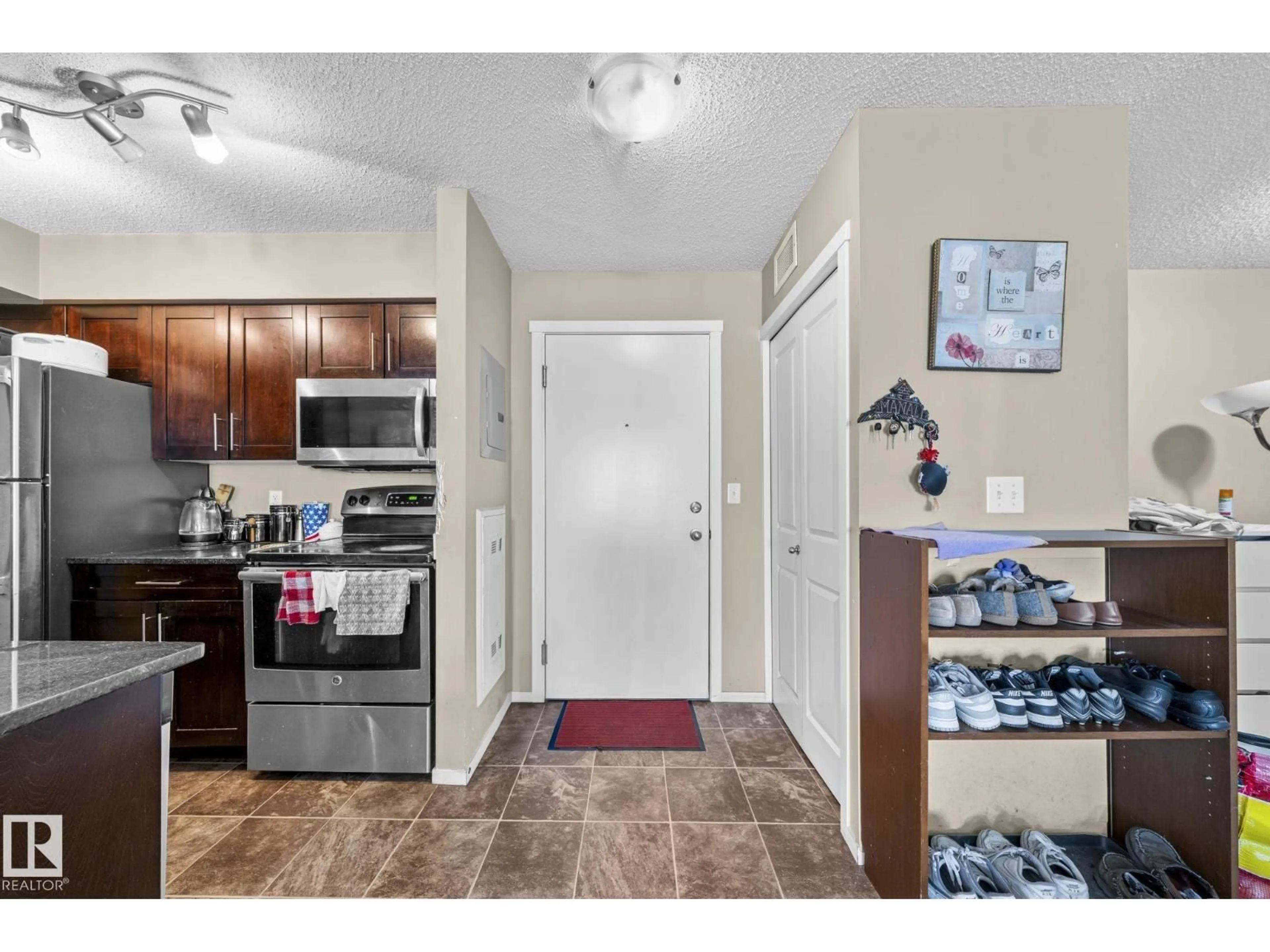 Standard kitchen, unknown for #203 - 3207 JAMES MOWATT TR SW, Edmonton Alberta T6W3L6