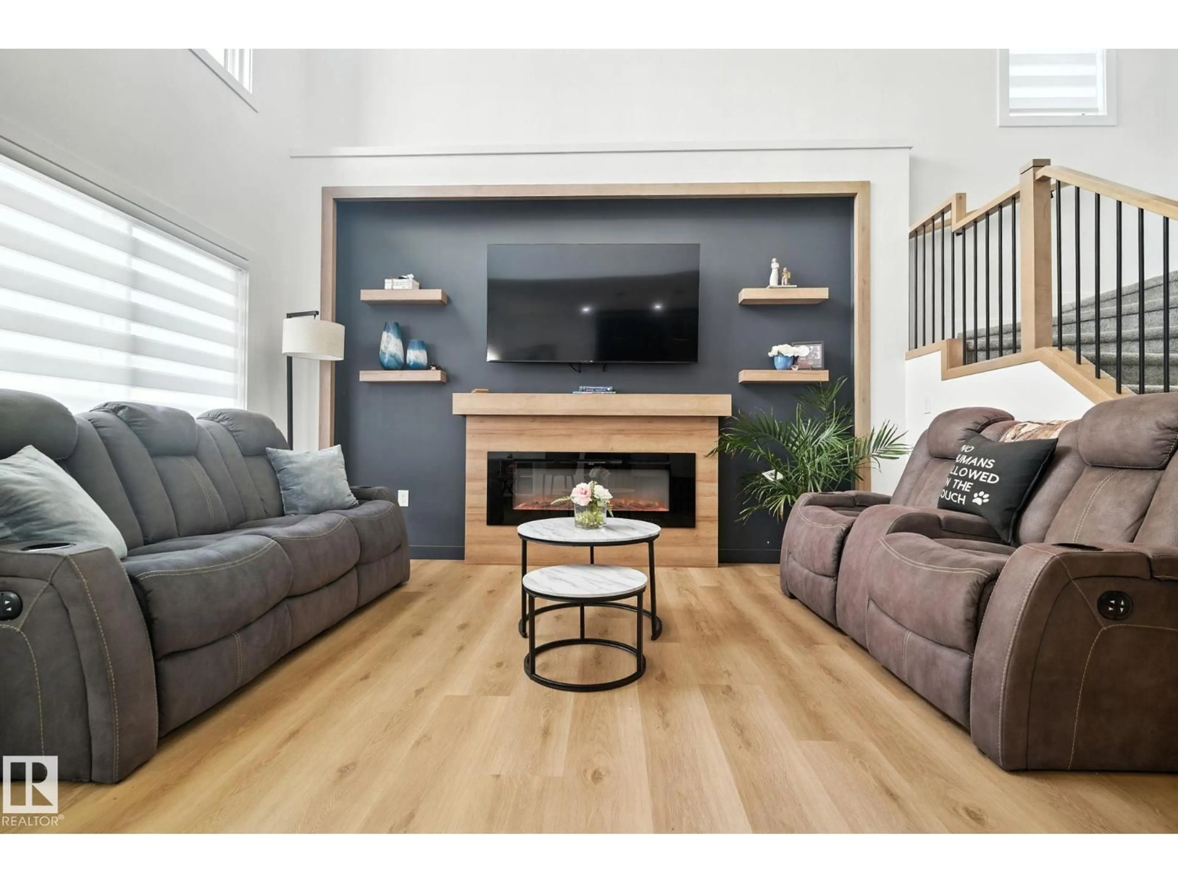 Living room with furniture, wood/laminate floor for 50 GRASSVIEW CR, Spruce Grove Alberta T7X3G1