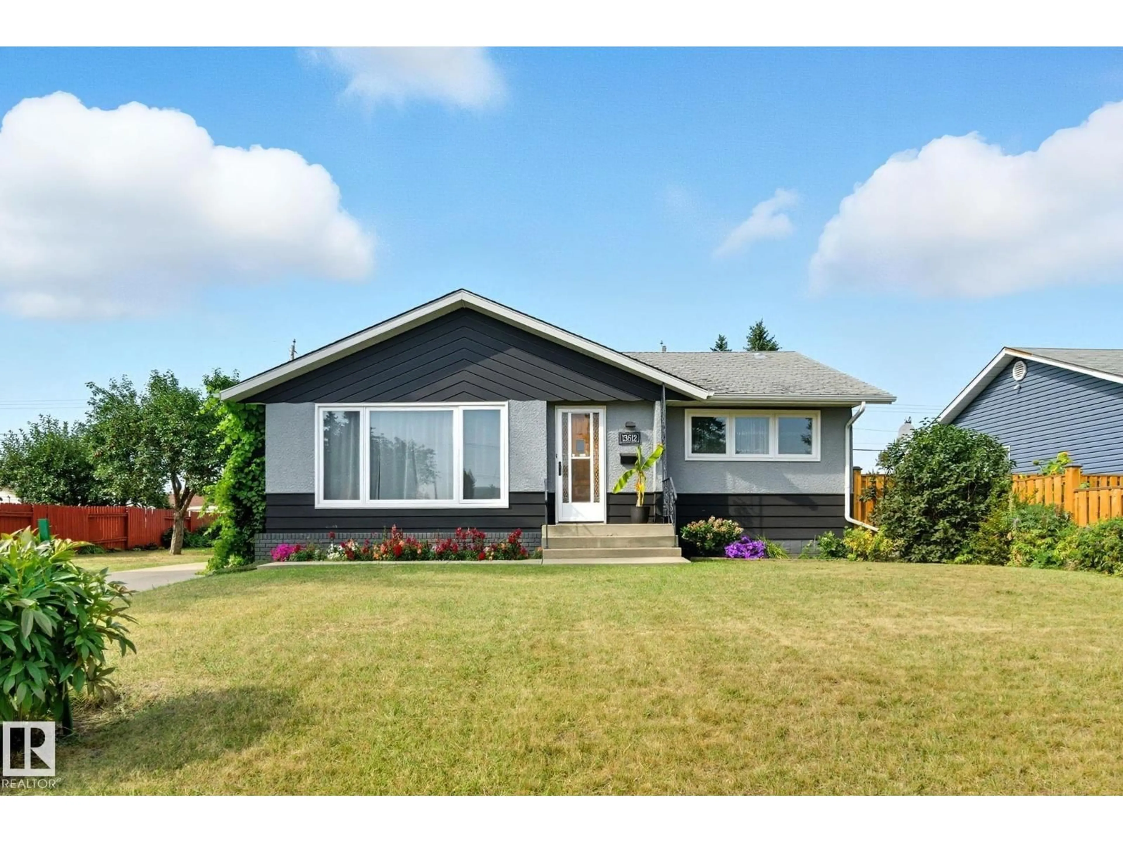 Home with vinyl exterior material, street for NW - 13612 135 ST, Edmonton Alberta T5L1Z5
